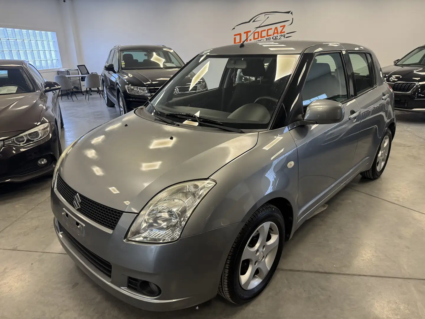Suzuki Swift 1.3i GLX  X.tension Grijs - 1