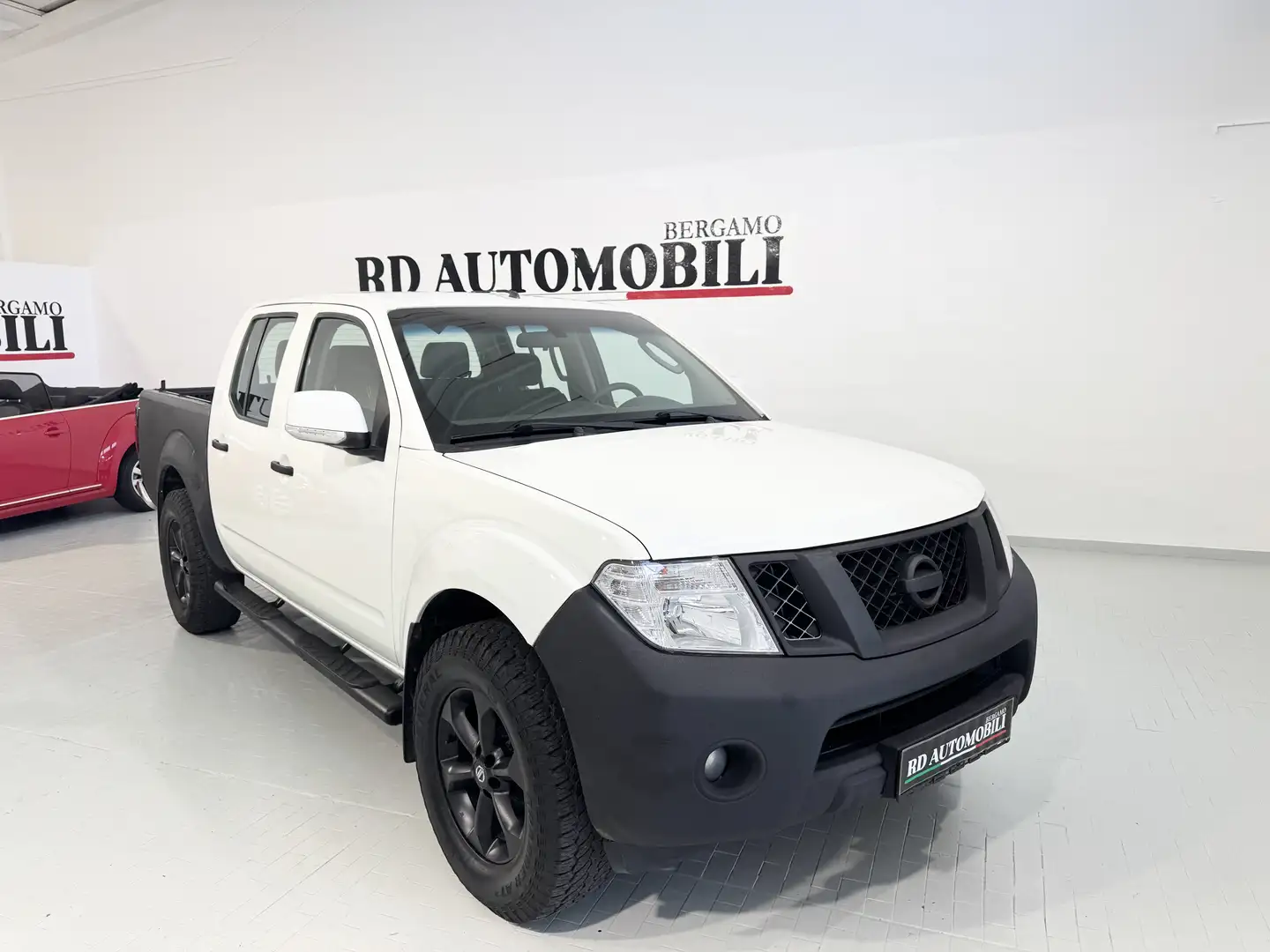 Nissan Navara Navara 2.5 dci d.cab Sport VERNICE RAPTOR Bianco - 1