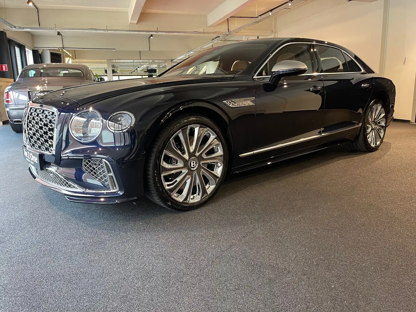 Bentley Flying Spur New Flying Spur V8 PHEV Mulliner (-16%) !!! Blauw - 1