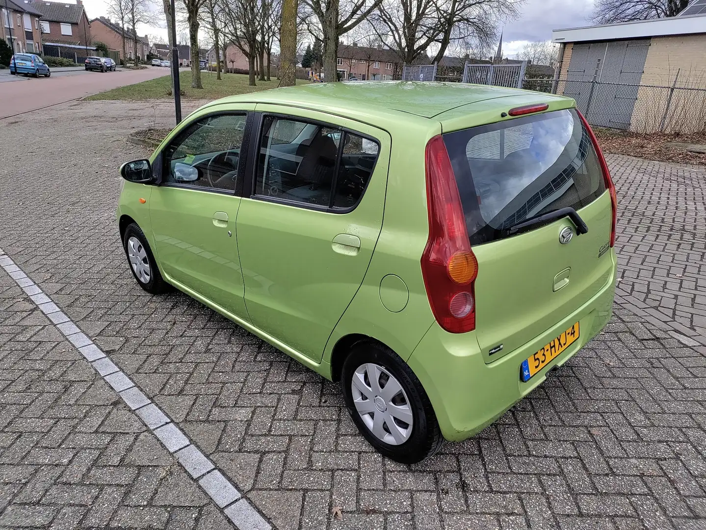 Daihatsu Cuore 1.0 Premium Apk tot 3/2026 Groen - 1