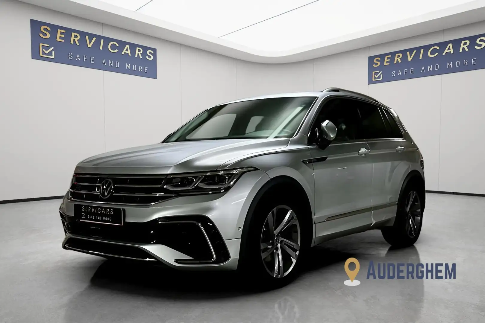 Volkswagen Tiguan 1.5 TSI R-Line Bus Premium/PANO/Gar Constructeur Grijs - 1