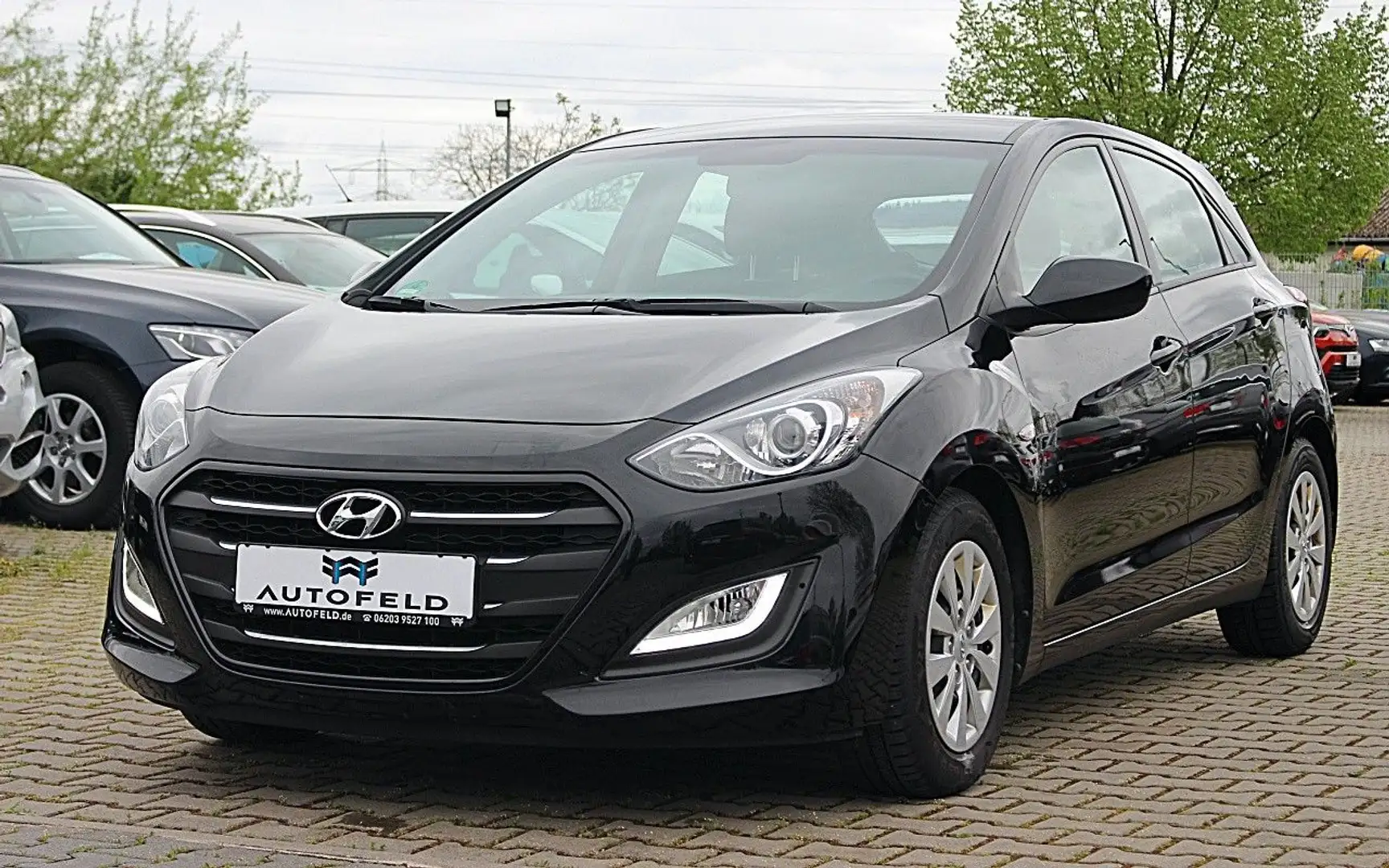 Hyundai i30 1.4/VOLL SHEFT/KLIMA/ALLWETTER/LEDTAG/ISOFIX Zwart - 1
