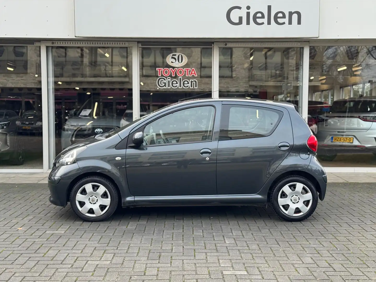 Toyota Aygo 1.0 VVT-I 5DRS Plus | Airco, Elektrisch bedienbare Gris - 2