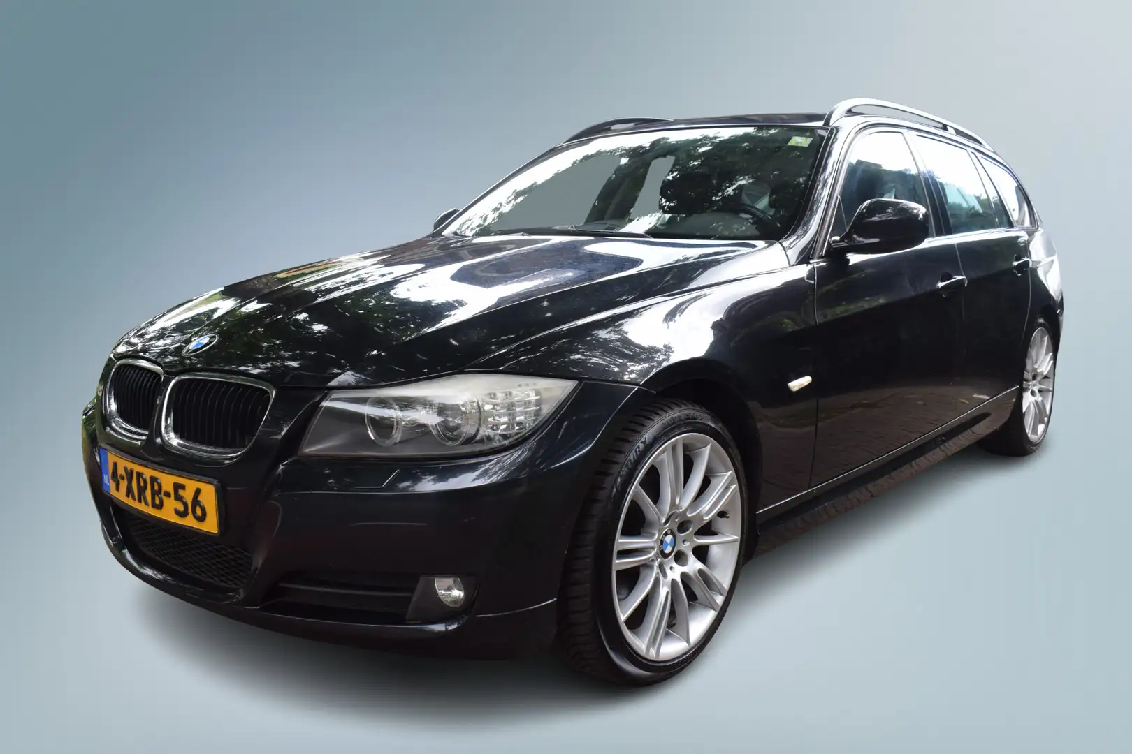 BMW 320 3-serie Touring 320i High Executive N.Distributie Zwart - 1