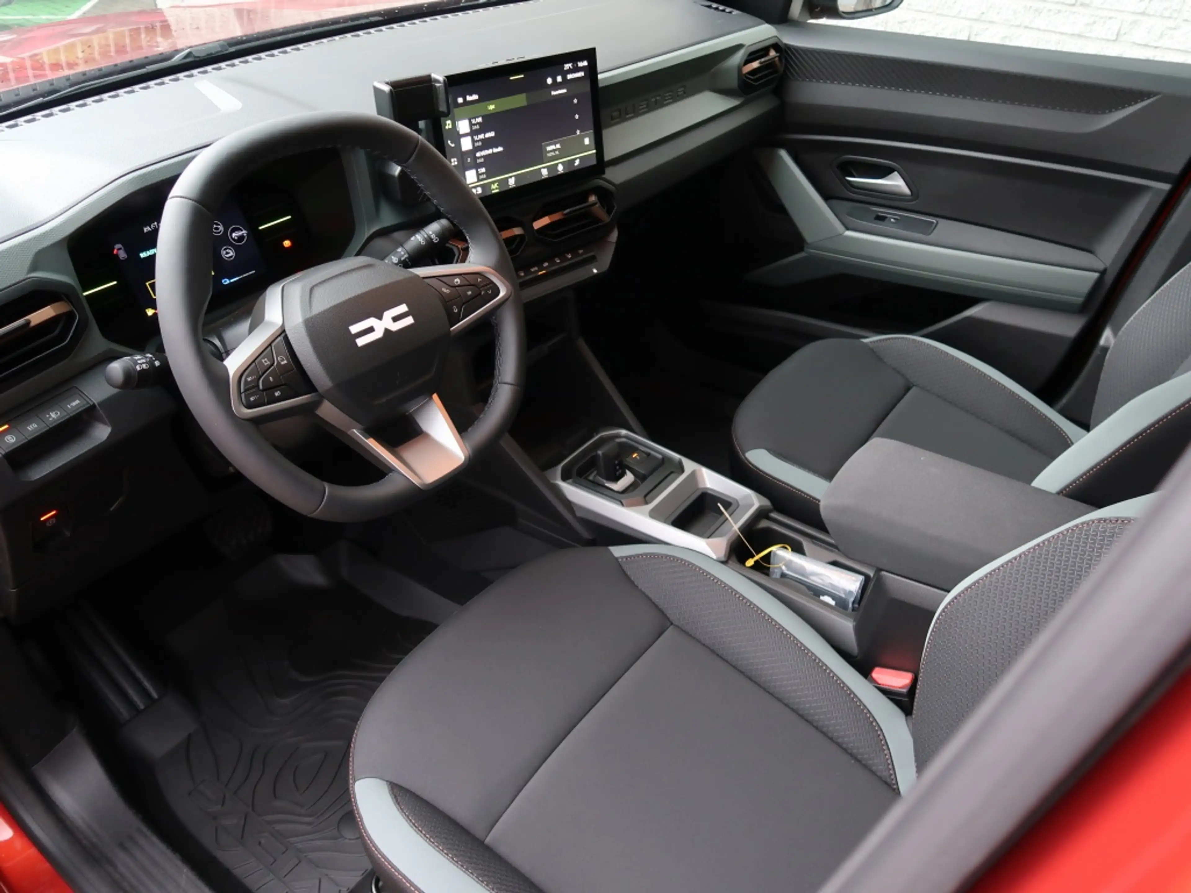 Dacia Duster 1.6 E-TECH Hybrid 140 Extreme | Navi | Stoel-/Stuu — photo 9