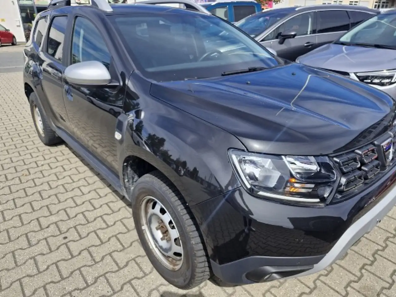 Dacia Duster II Celebration 1,3 TCe150 8-fach bereift AHK — photo 2