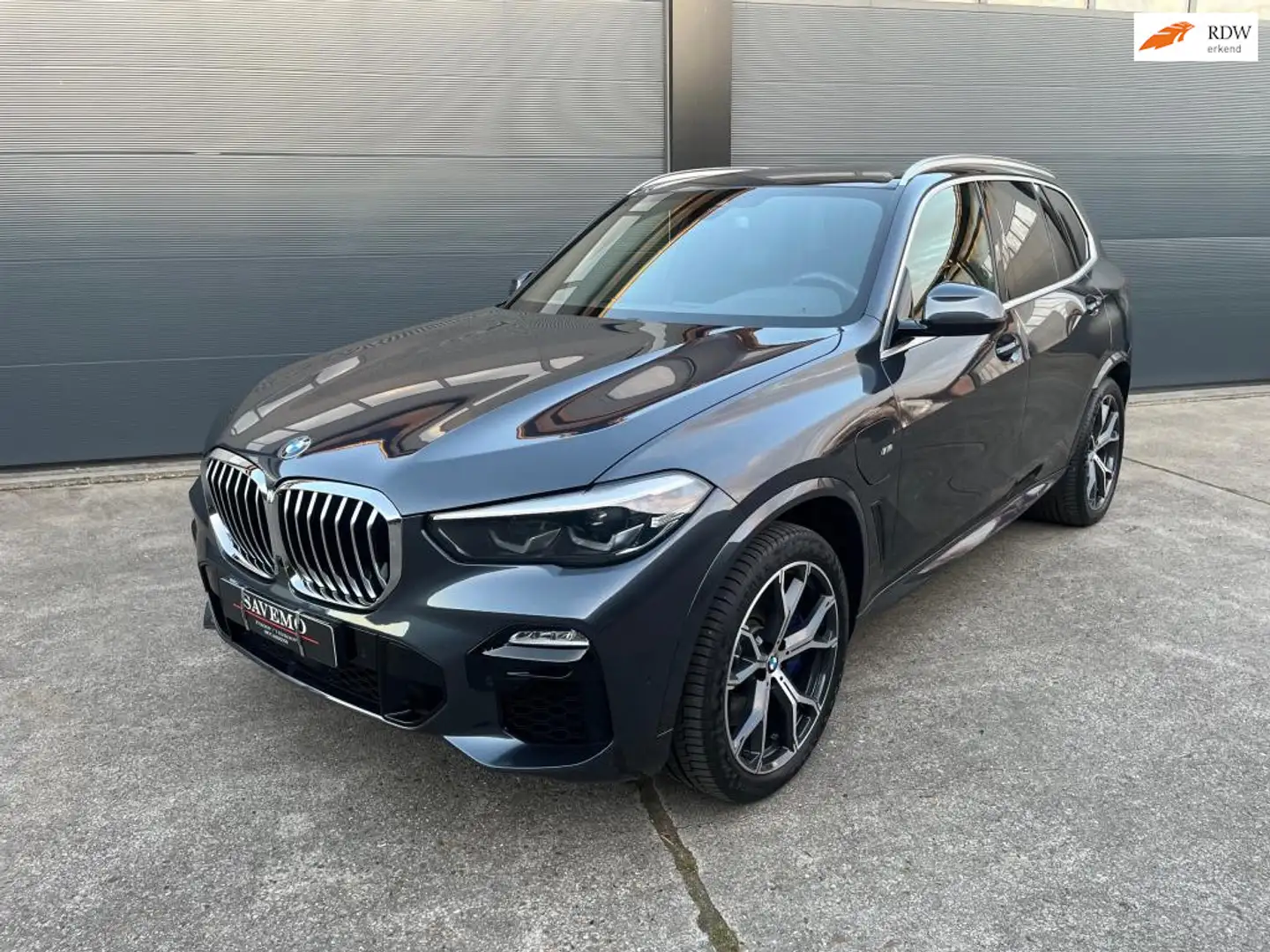 BMW X5 XDrive45e High Executive Panoramadak / Elektrische Grijs - 1