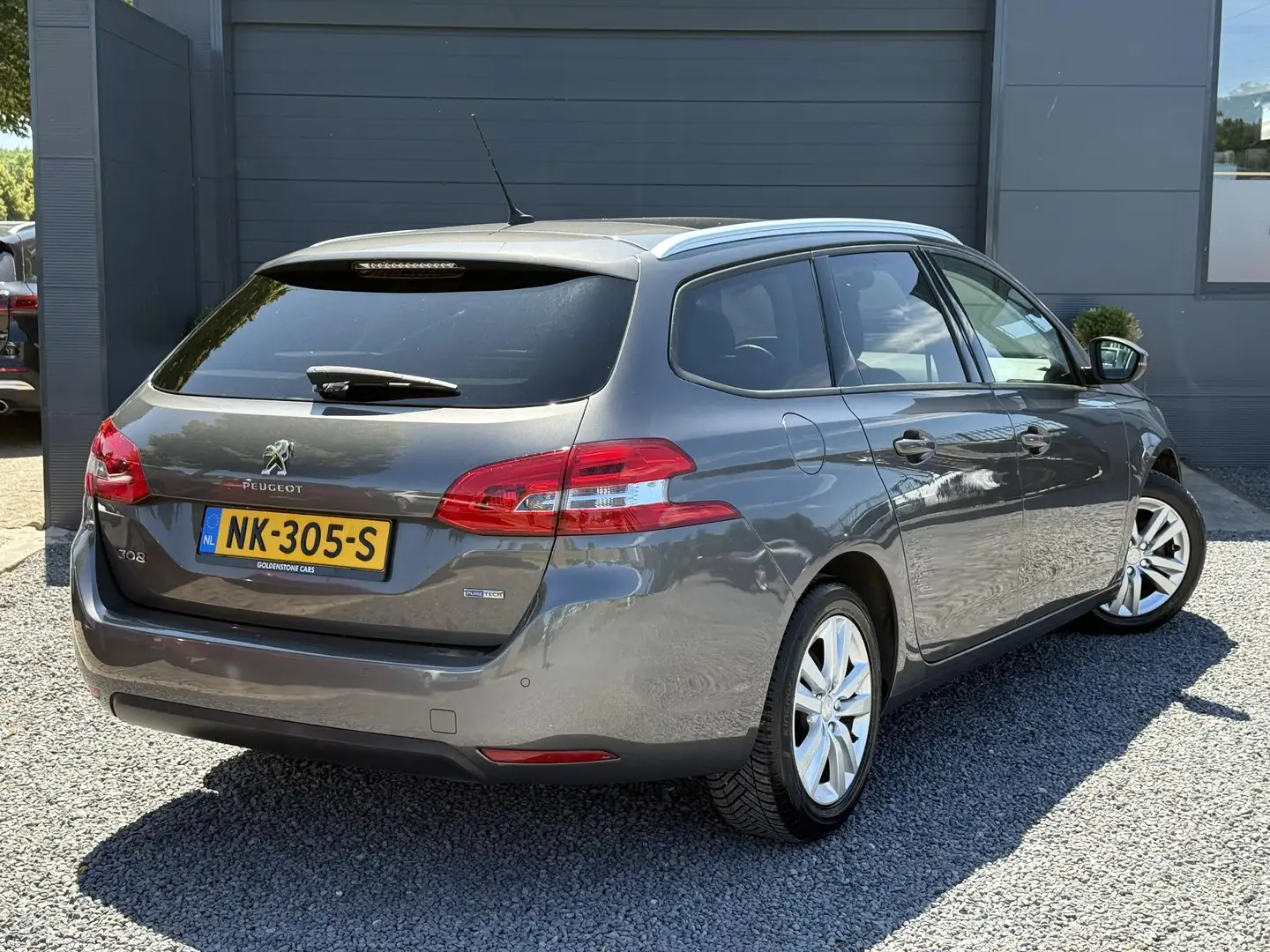 Peugeot 308 SW 1.2 PureTech Blue Lion 2e Eigenaar,Navi,Pano,11 Grijs - 2