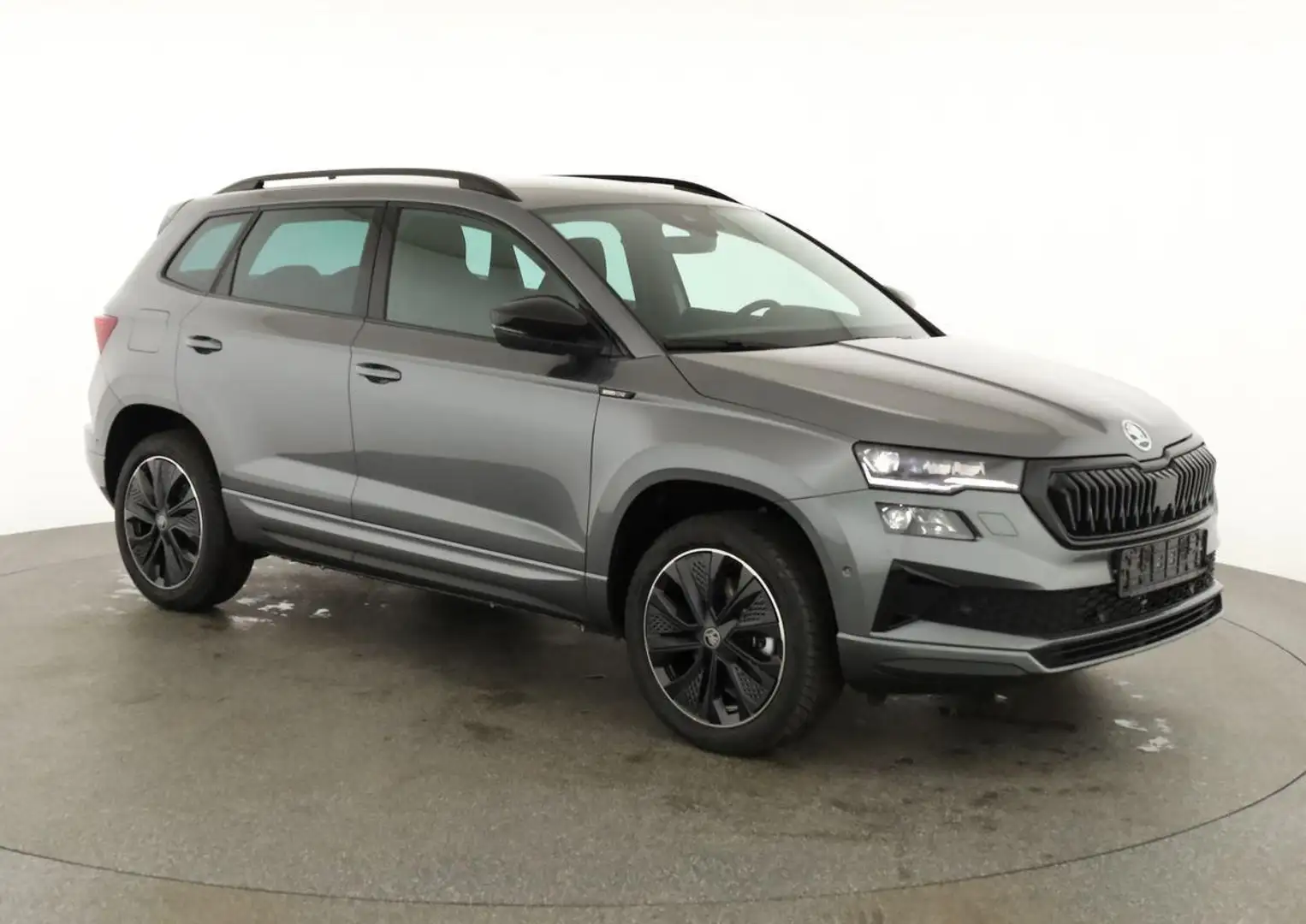 Skoda Karoq Sportline 1.5 TSI DSG Sportline, AHK, Navi, CAN... Grau - 1