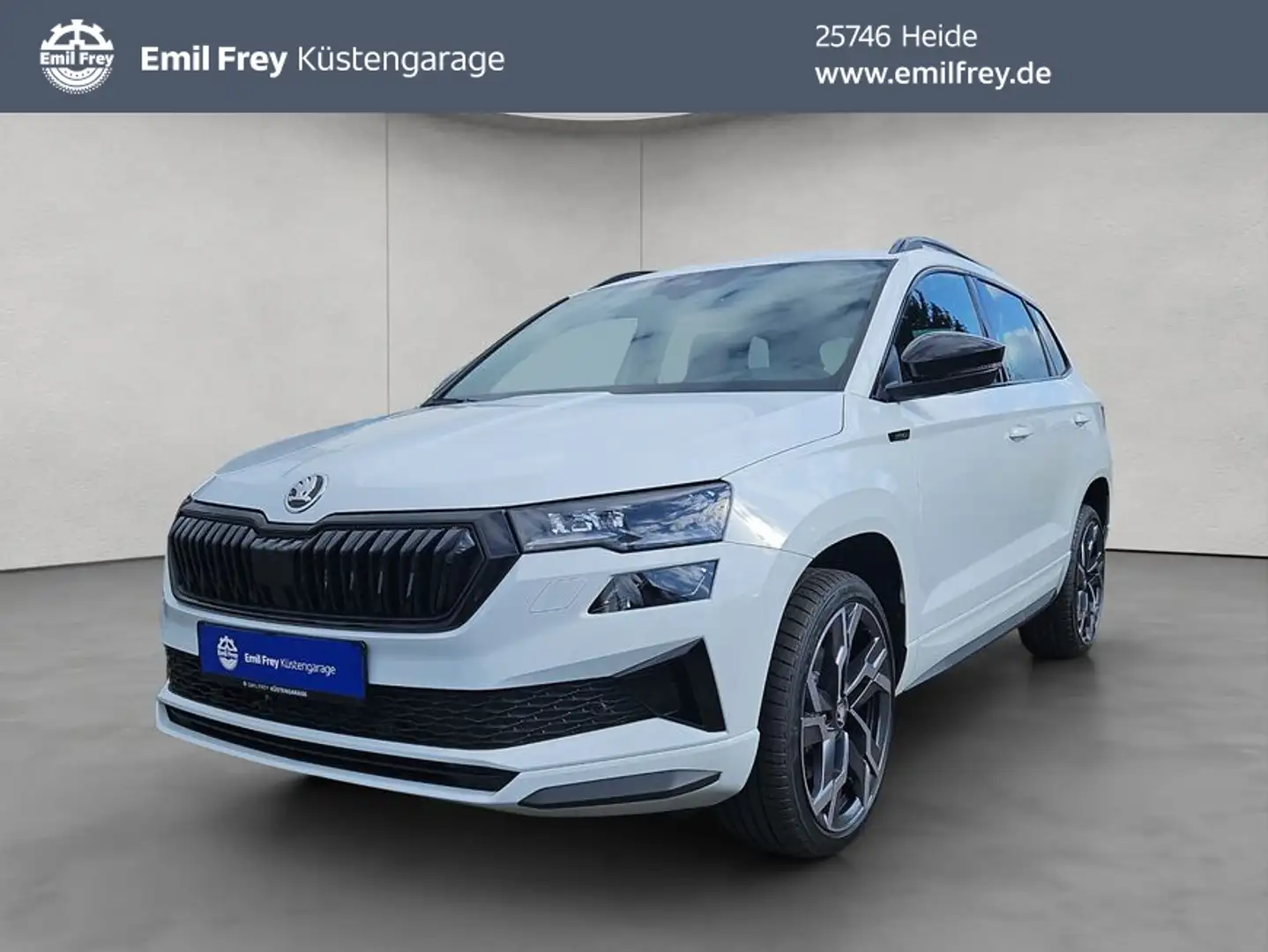 Skoda Karoq 2.0 TDI Sportline schwenk. AHK RFK Navi Weiß - 1