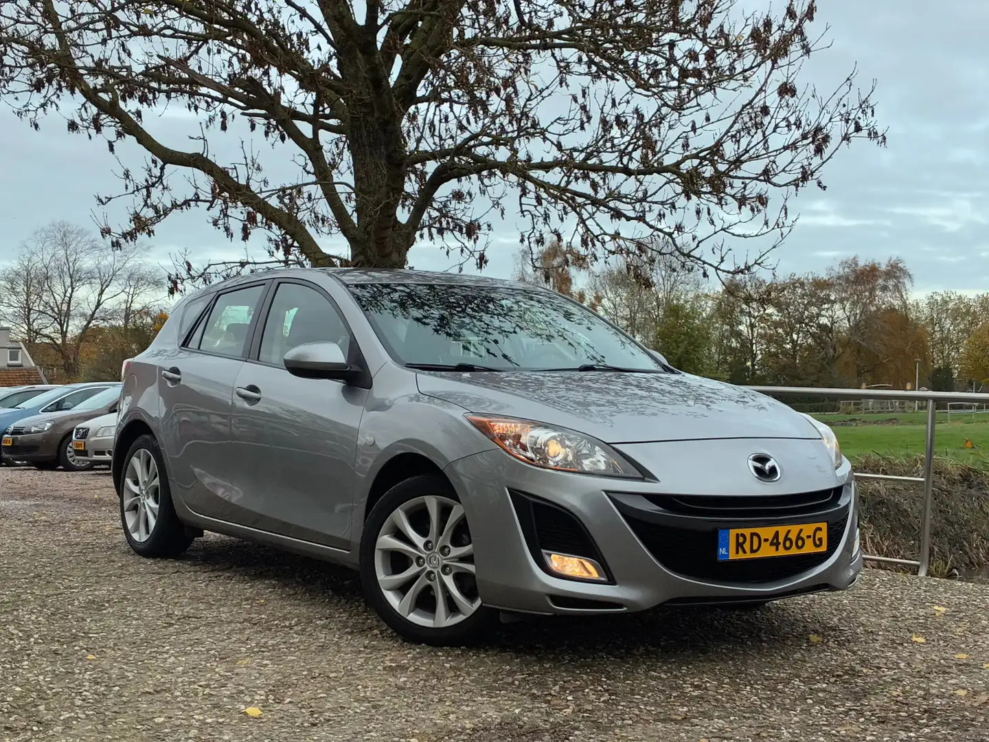Mazda 3 1.6 GT-M Line | 5-Deurs + Cruise + Airco + Stoel v Gris - 1