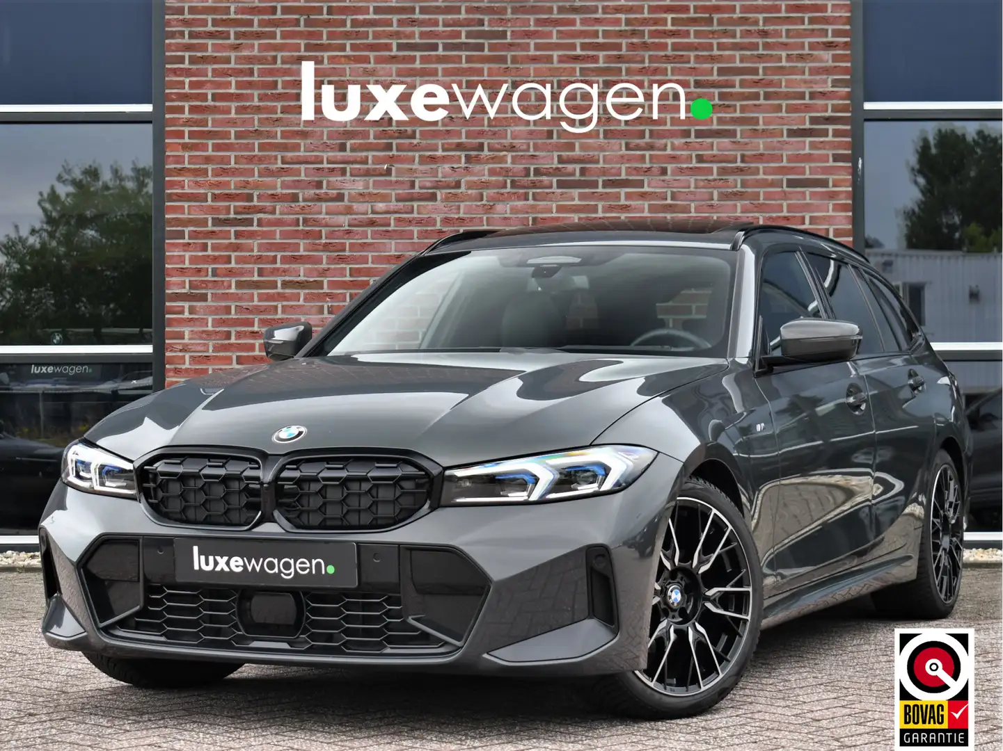 BMW 320 3-serie Touring 320d M-Sport Dravit Pano ACC El-ze Grijs - 1