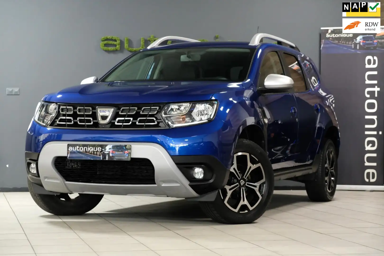 Dacia Duster 1.3 TCe Prestige *LEDEREN BEKLEDING* Navigatie/Ach Blauw - 1