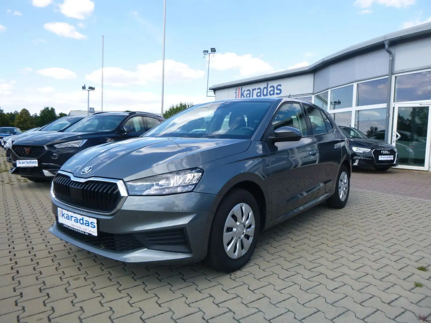 Skoda Fabia Lim 1,0 TSI Ambition AUT/NAV/LED/KAM/PDC Gris - 1