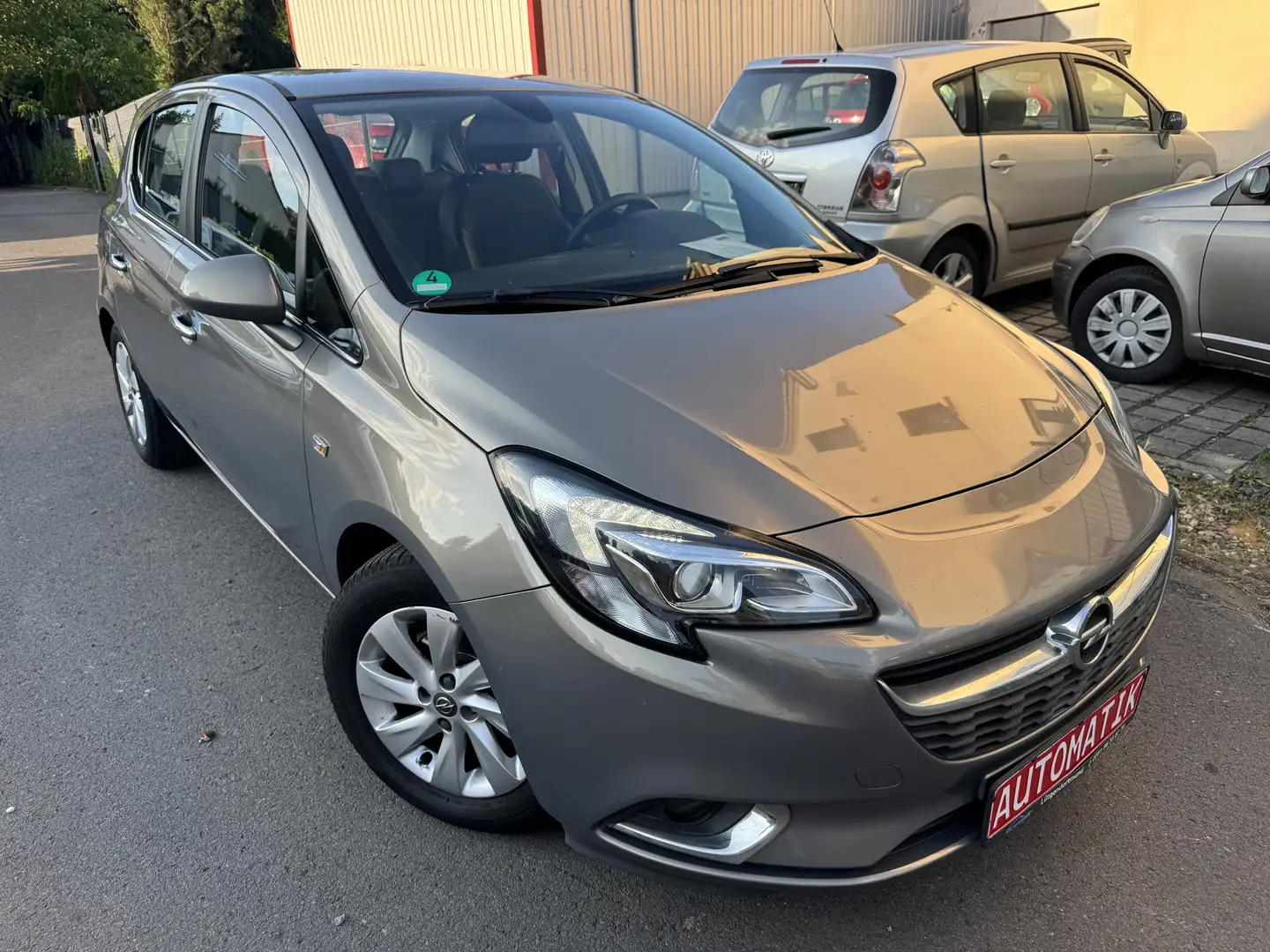 Opel Corsa 1.4 Automatik/LPG/Xenon/SHZ/LHZ/Klima/Temp/PDC/Alu Braun - 1