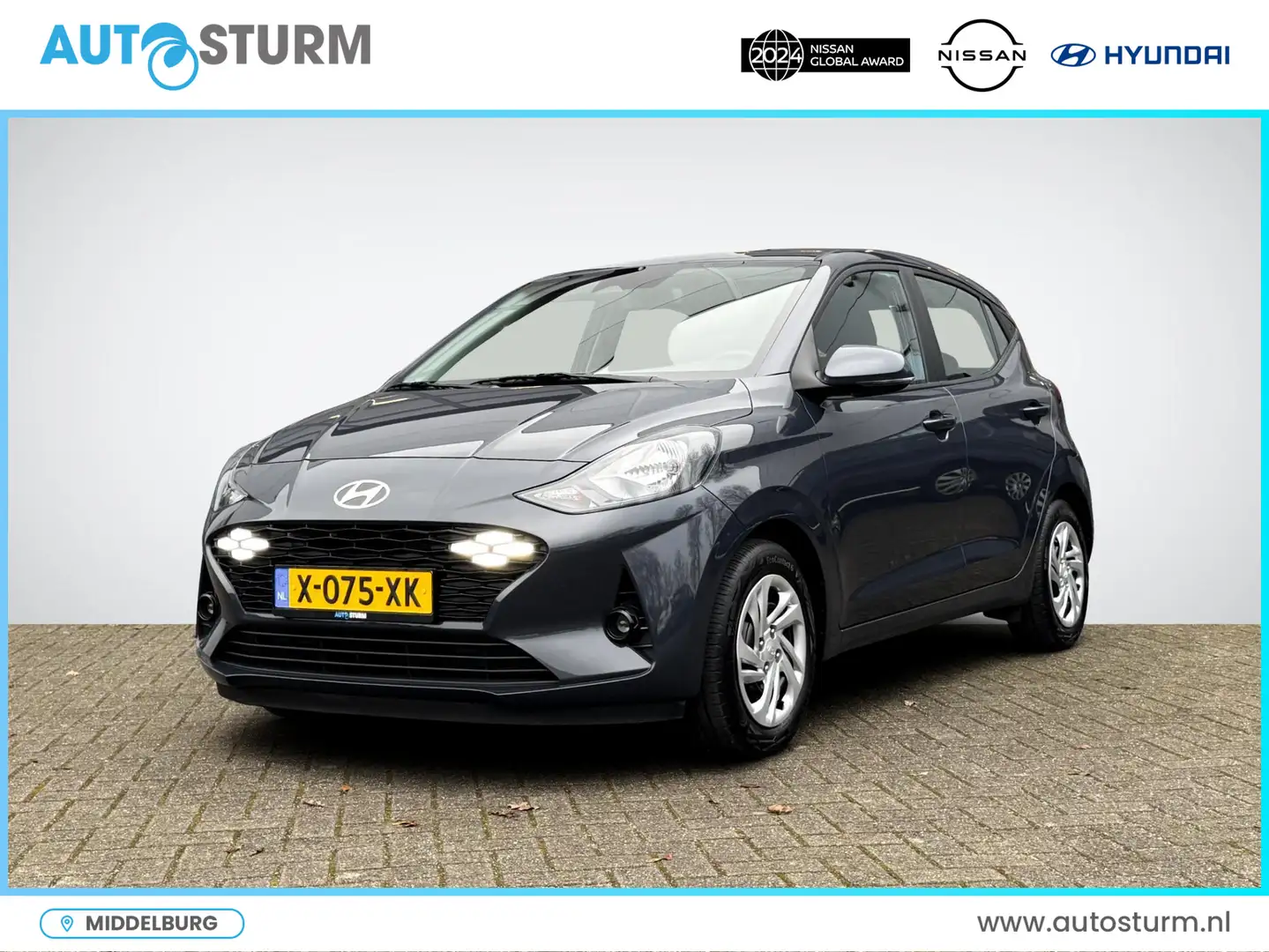 Hyundai i10 1.0 Comfort Smart | Navigatie | Camera | Apple Car Grijs - 1