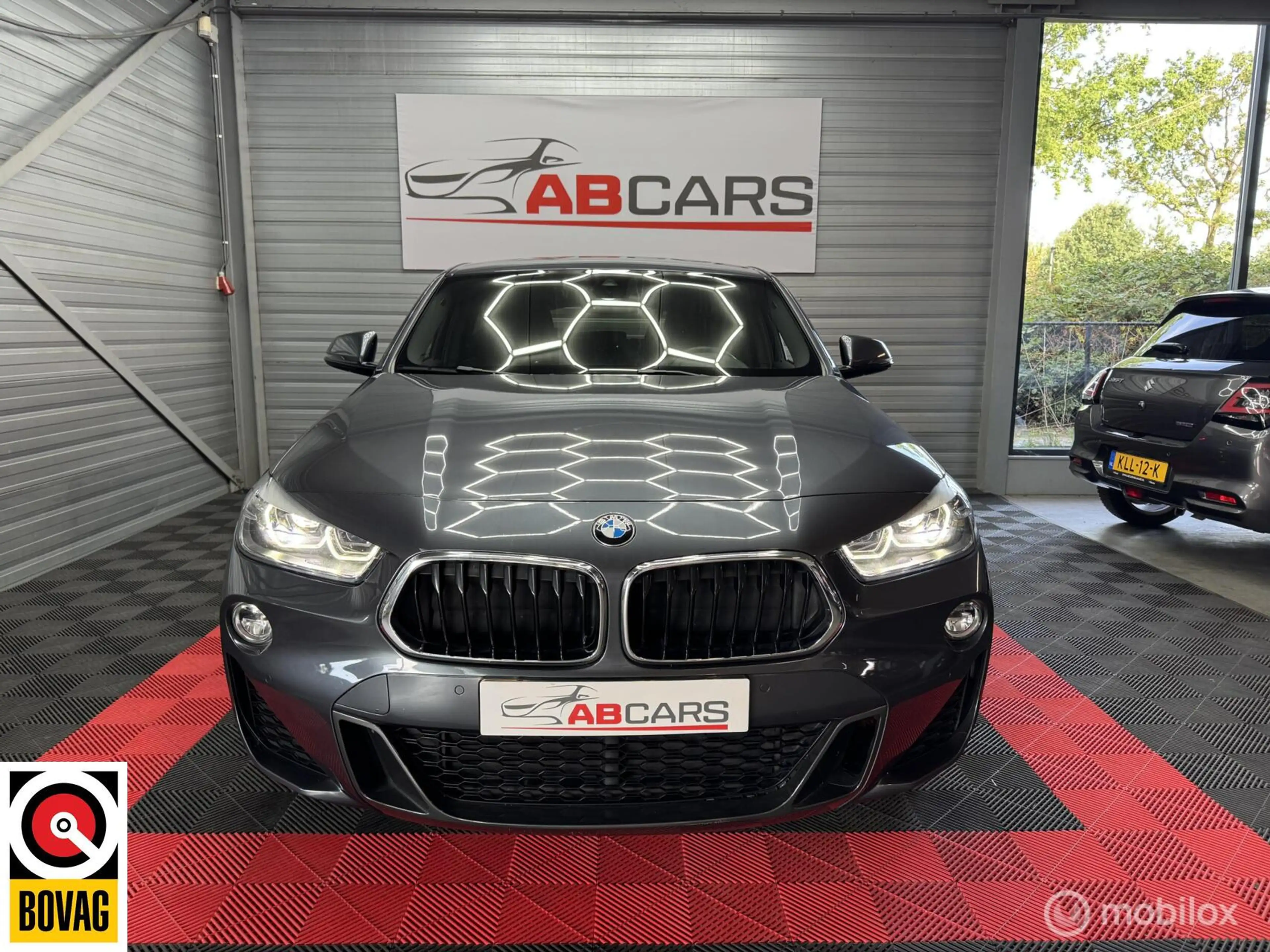 BMW X2 sDrive18i High Executive M-Pakket — photo 2