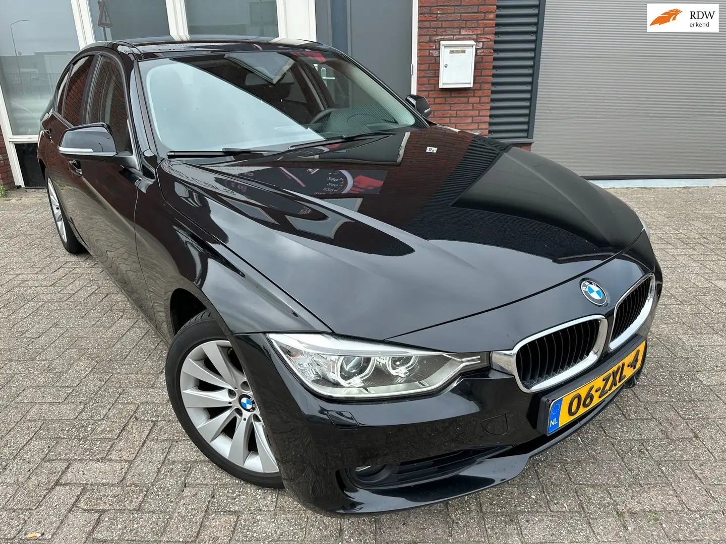 BMW 320 3-serie 320i High Executive / Navi / PDC / Clima / Nero - 1