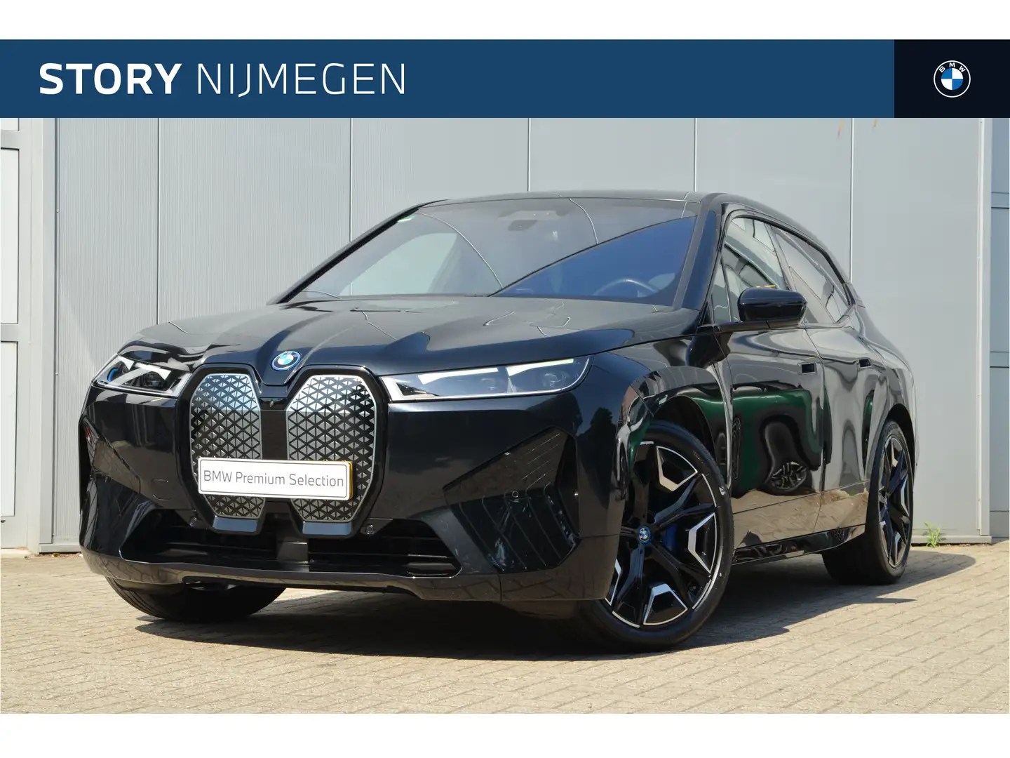 BMW iX xDrive40 High Executive / Sportpakket / Panoramada Zwart - 1