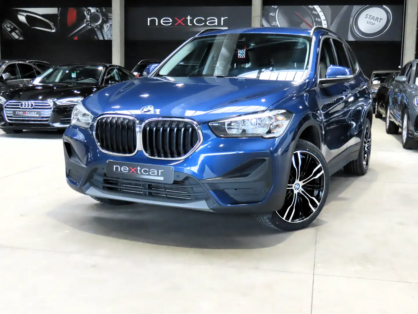 BMW X1 18dA SDrive *NAVI PRO-CRUISE-CAMERA-PARKING AV&AR* Blauw - 1
