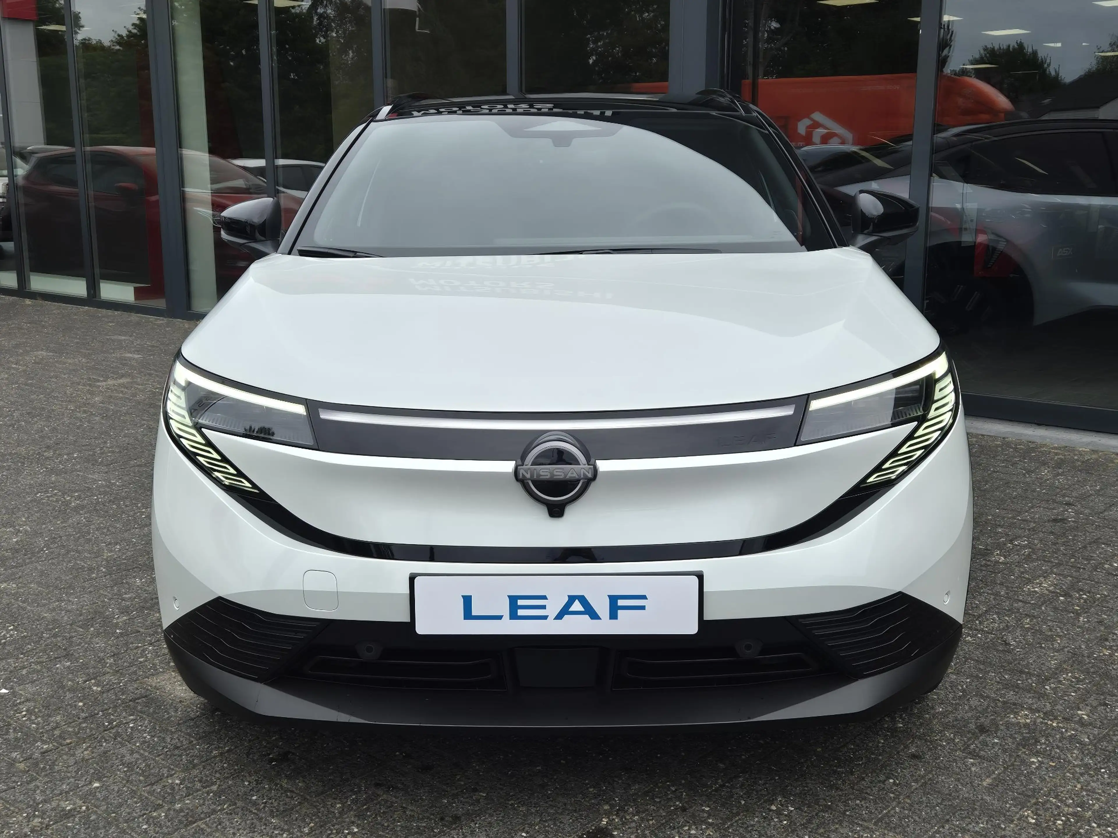 Nissan Leaf Evolve 75 kWh | Bose | Leder | Panoramadak | Actie — photo 17