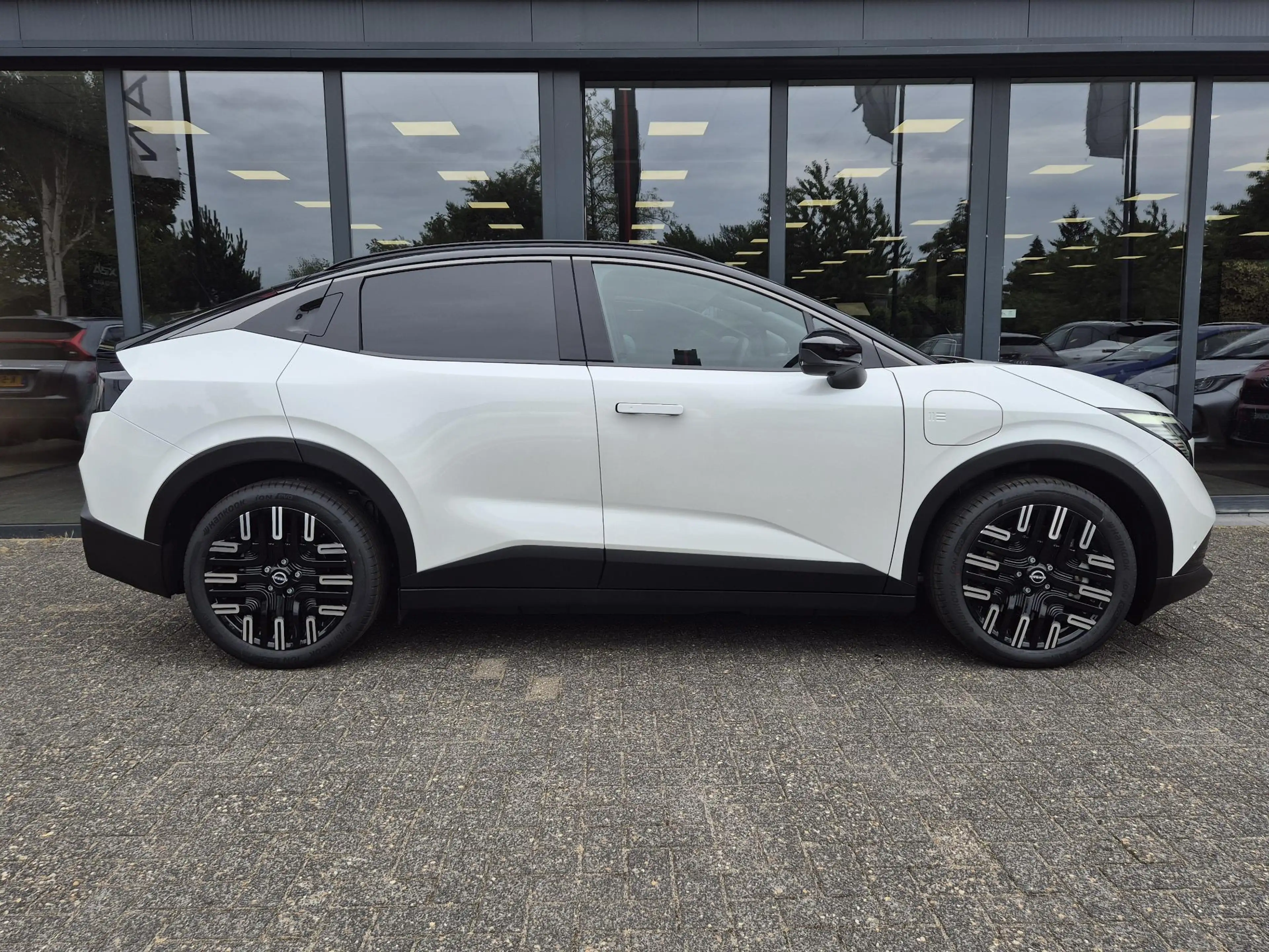Nissan Leaf Evolve 75 kWh | Bose | Leder | Panoramadak | Actie — photo 16