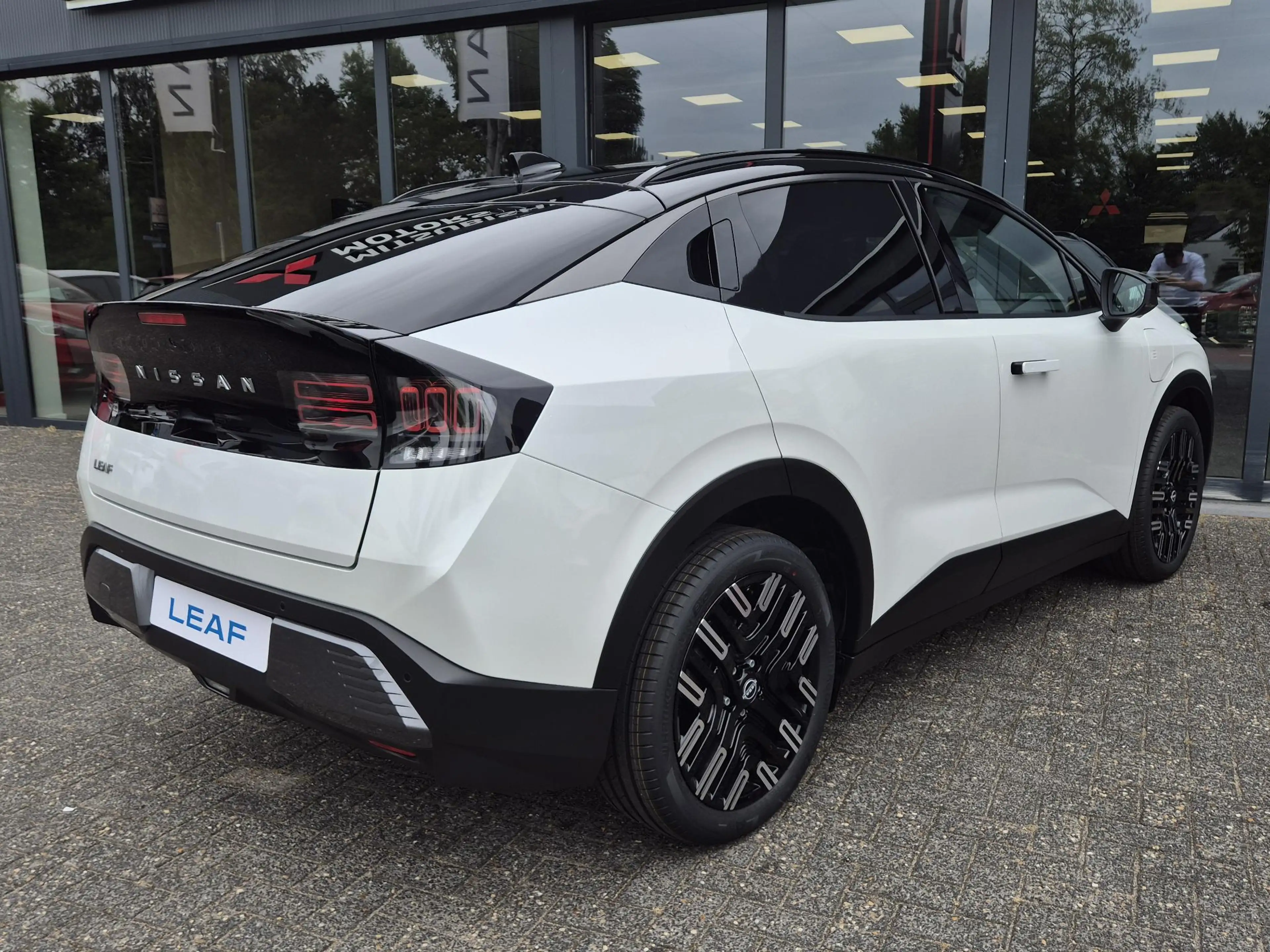 Nissan Leaf Evolve 75 kWh | Bose | Leder | Panoramadak | Actie — photo 2