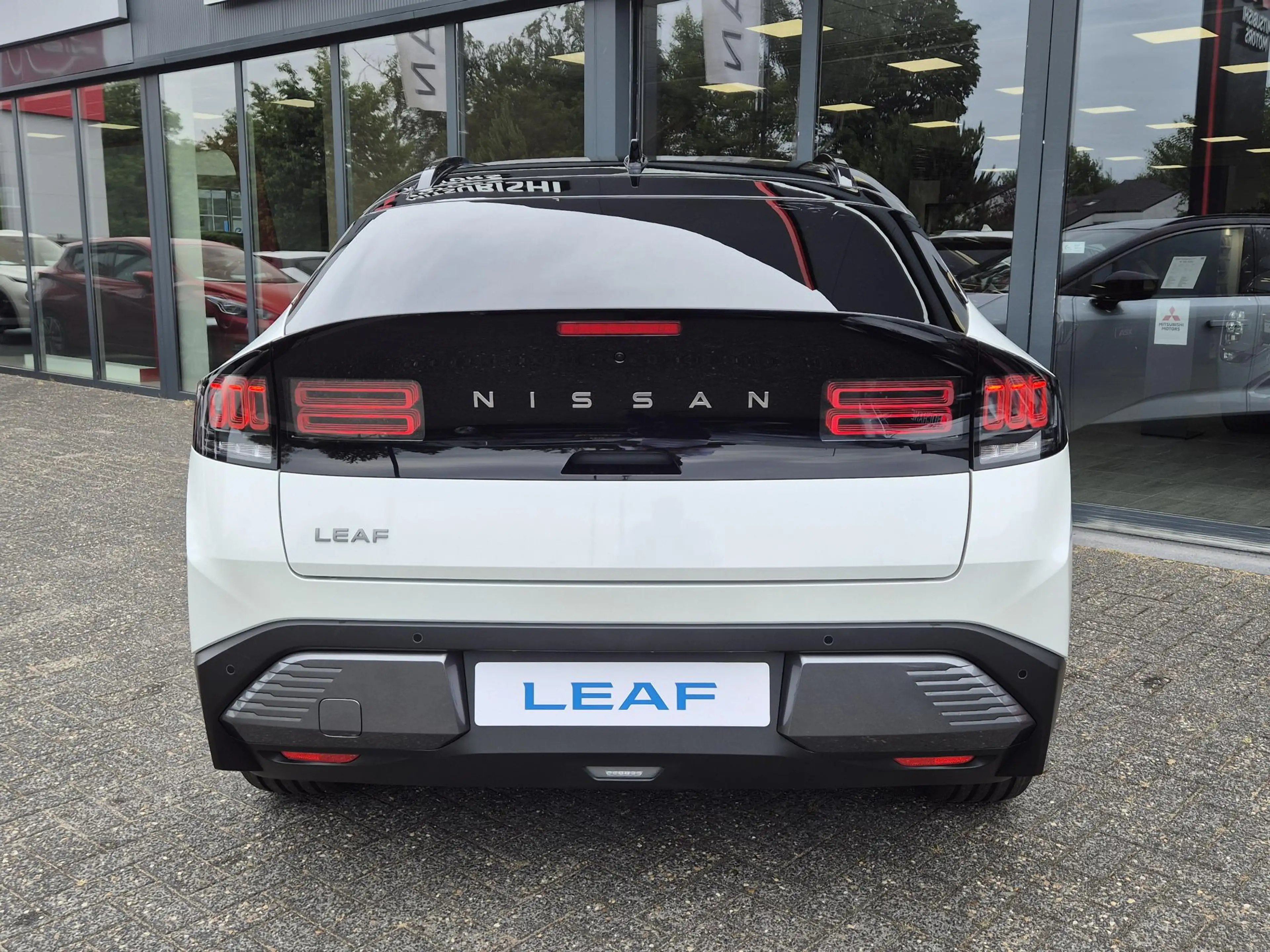 Nissan Leaf Evolve 75 kWh | Bose | Leder | Panoramadak | Actie — photo 18
