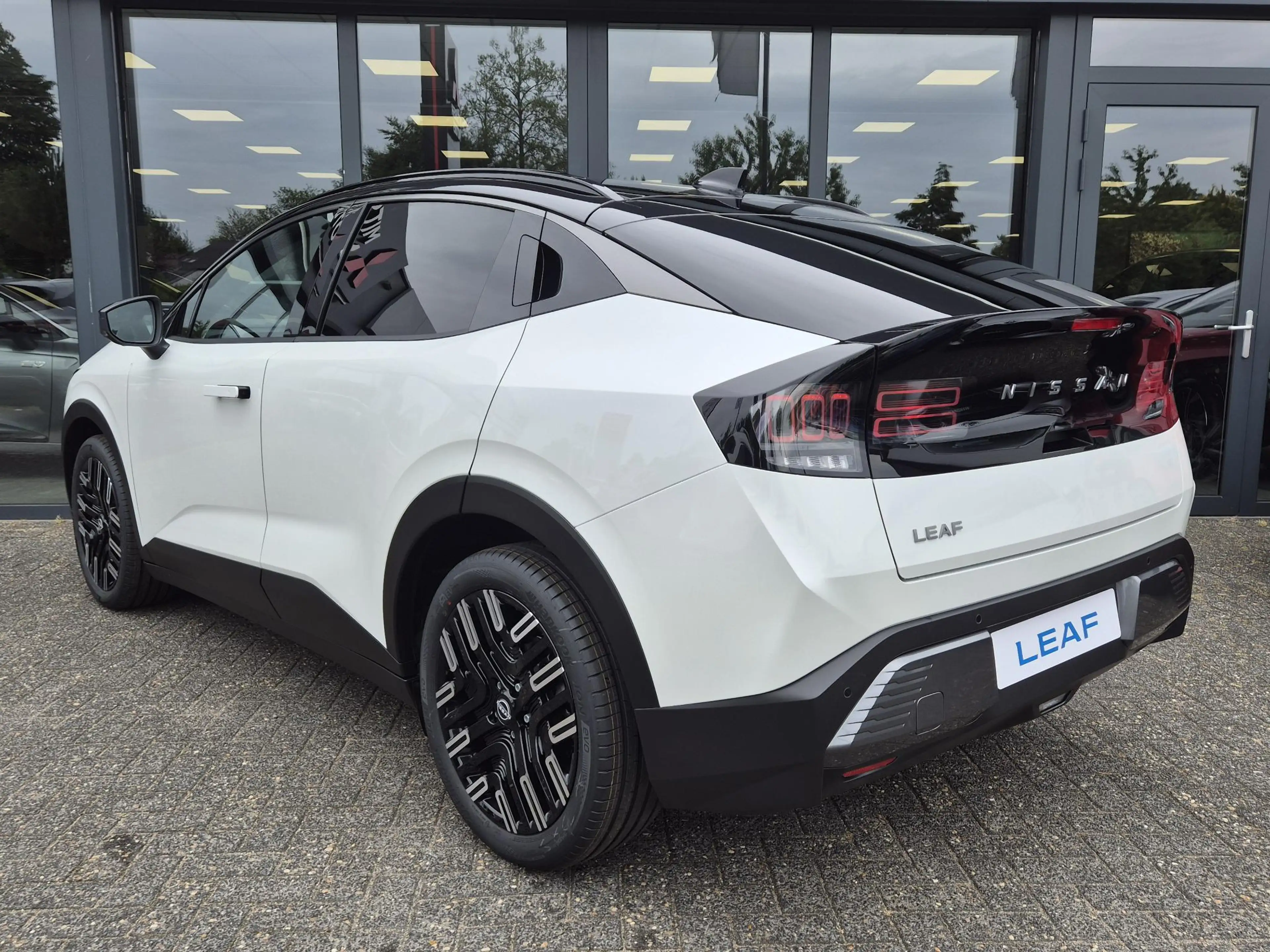 Nissan Leaf Evolve 75 kWh | Bose | Leder | Panoramadak | Actie — photo 6