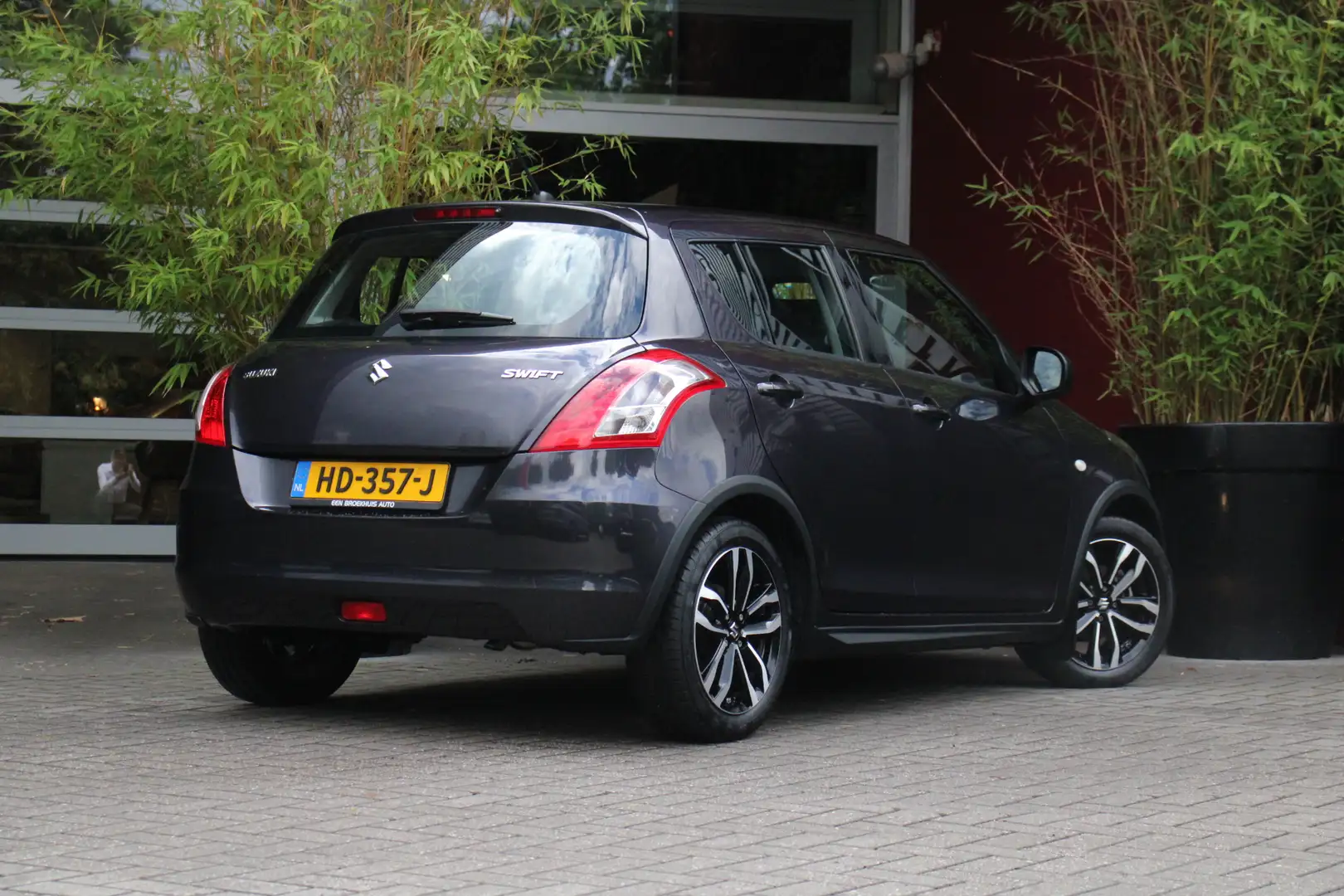 Suzuki Swift 1.2 Style EASSS | Cruise Control | Airco | Radio | Grijs - 2
