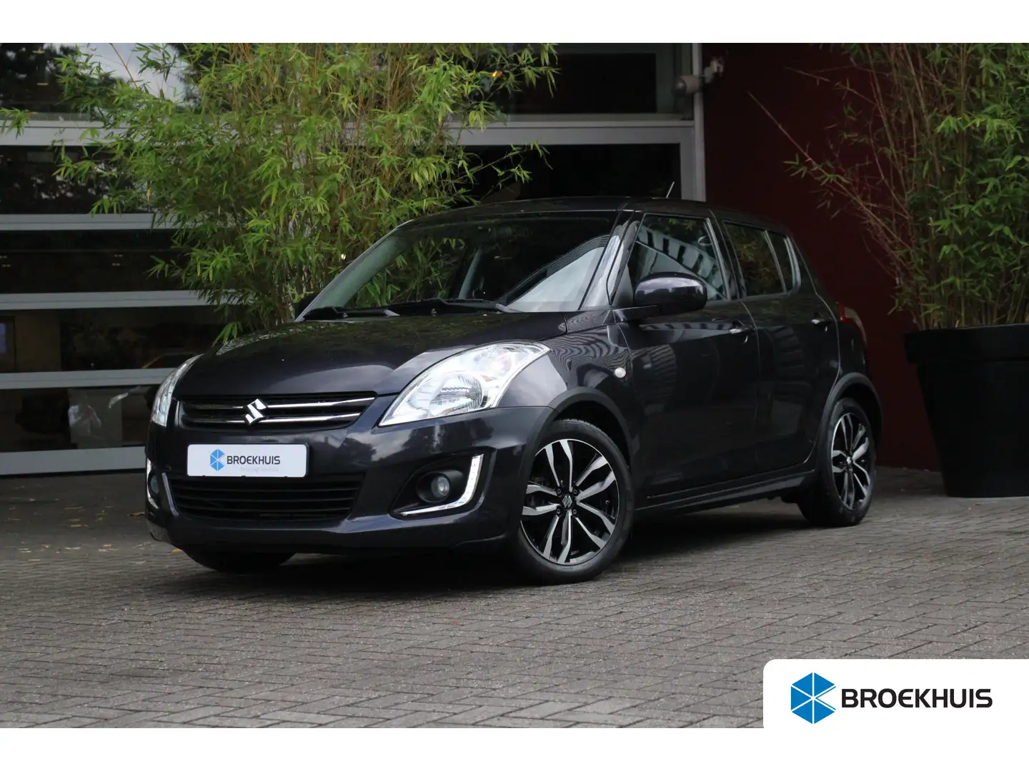 Suzuki Swift 1.2 Style EASSS | Cruise Control | Airco | Radio | Grijs - 1