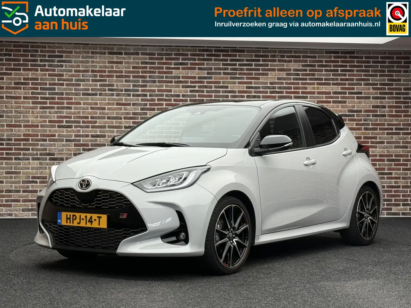 Toyota Yaris 1.5 Hybrid GR Sport CAMERA LANE ASSIST CLIMATE NAV Grijs - 1