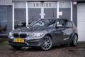BMW 118 1-serie 118i AUT8 High-Executive I Leder I Trekhaa Grijs - thumbnail 1