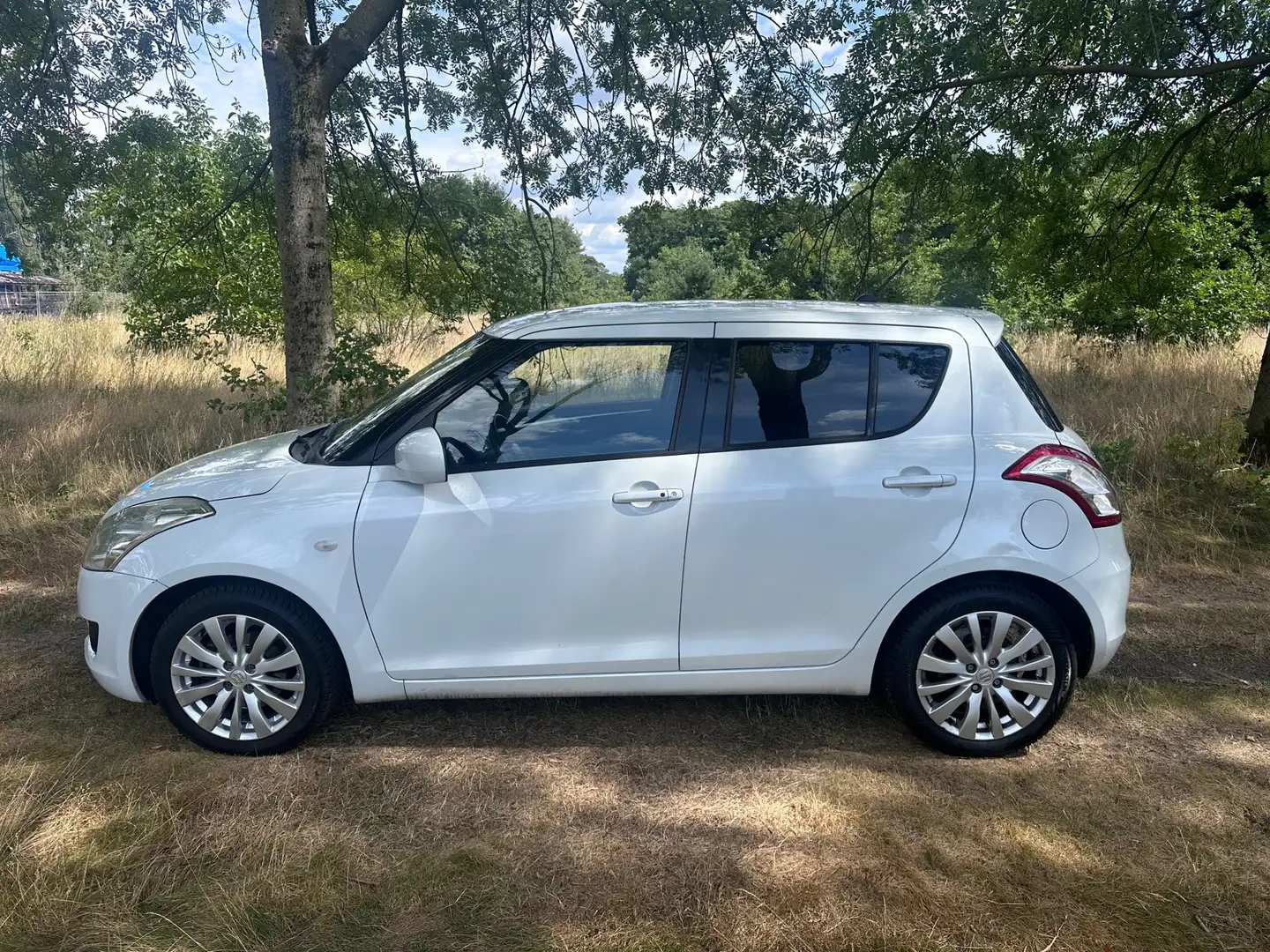 Suzuki Swift 1.2 Exclusive EASSS apk t/m 23-02-2026 Wit - 2