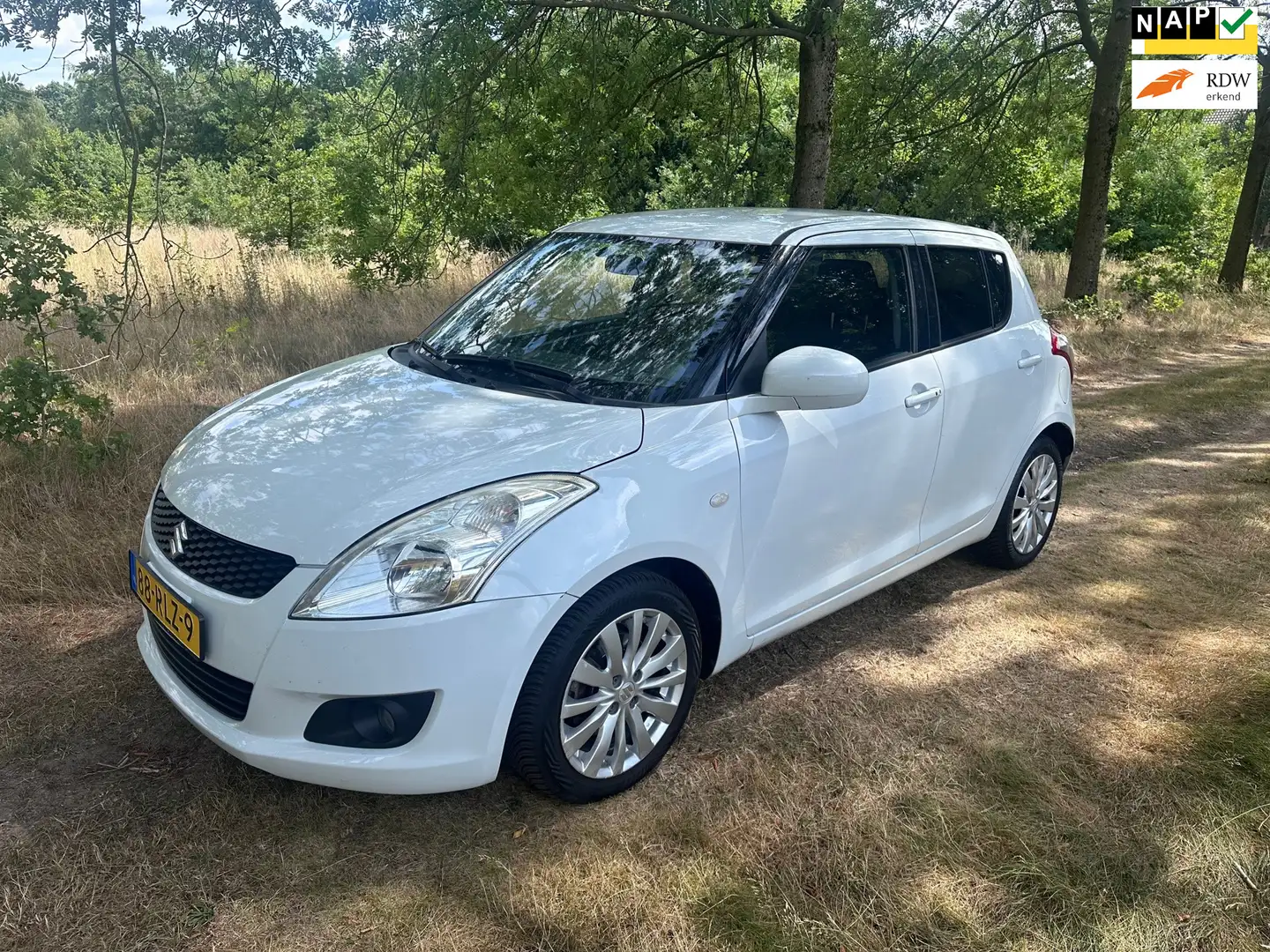 Suzuki Swift 1.2 Exclusive EASSS apk t/m 23-02-2026 Wit - 1