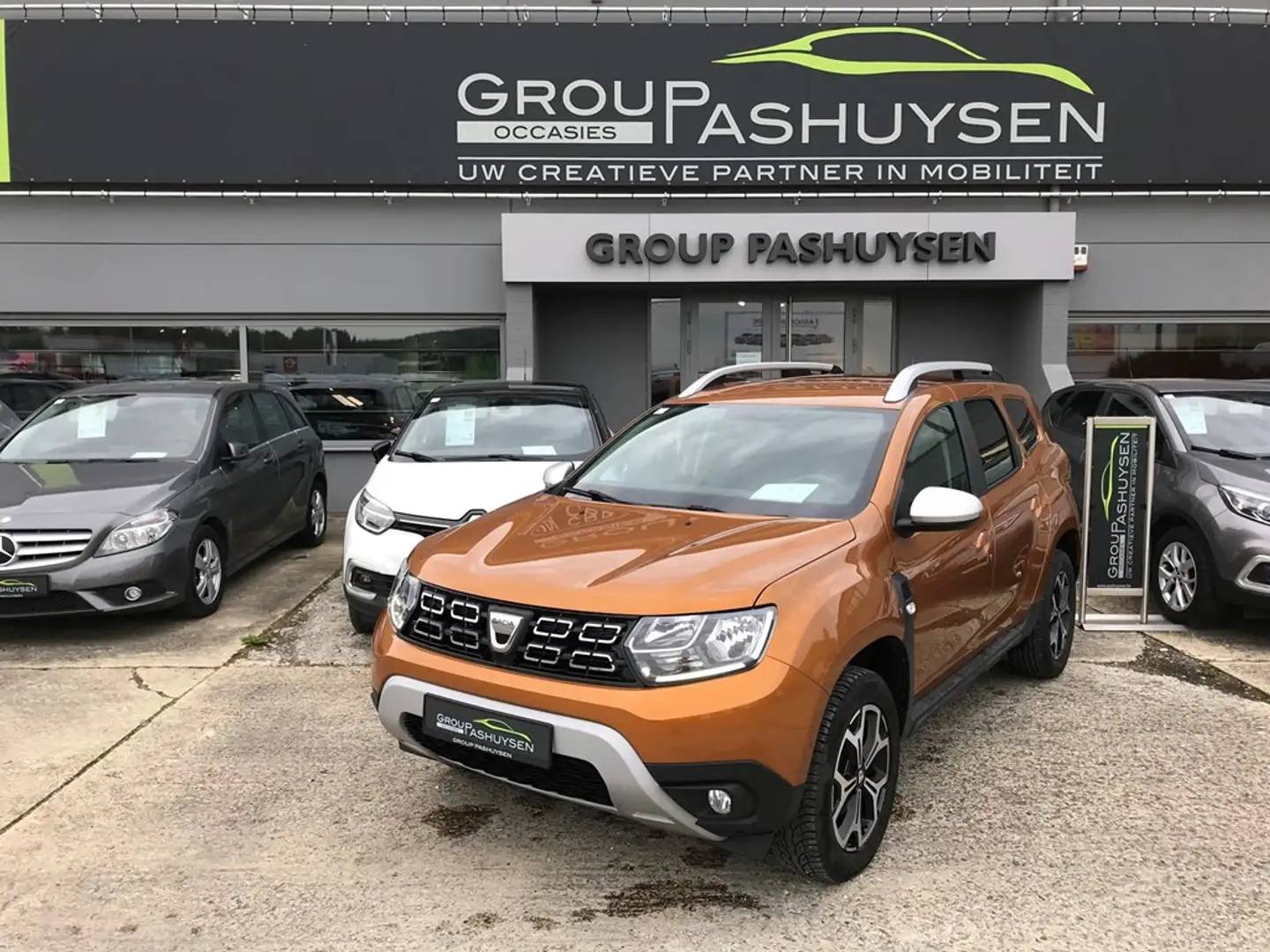 Dacia Duster Prestige 1.0TCe 91PK Oranje - 1