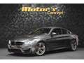 BMW M4 F82 Coupé DKG7 Zwart - thumbnail 1