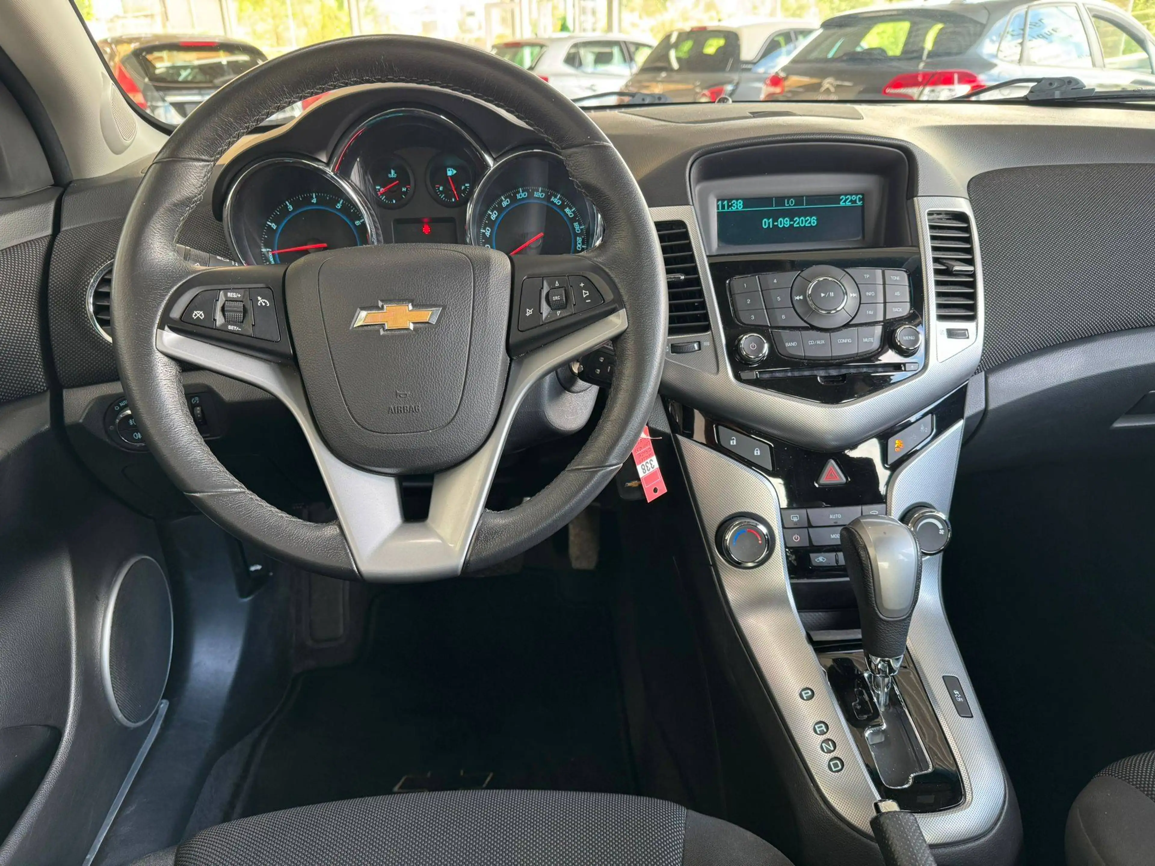 Chevrolet Cruze 🟩 1.8 ESSENCE 140CH - AUTOMATIQUE - AIRCO - CAPTEUR - FAIBLE KILOMETRAGE — photo 8
