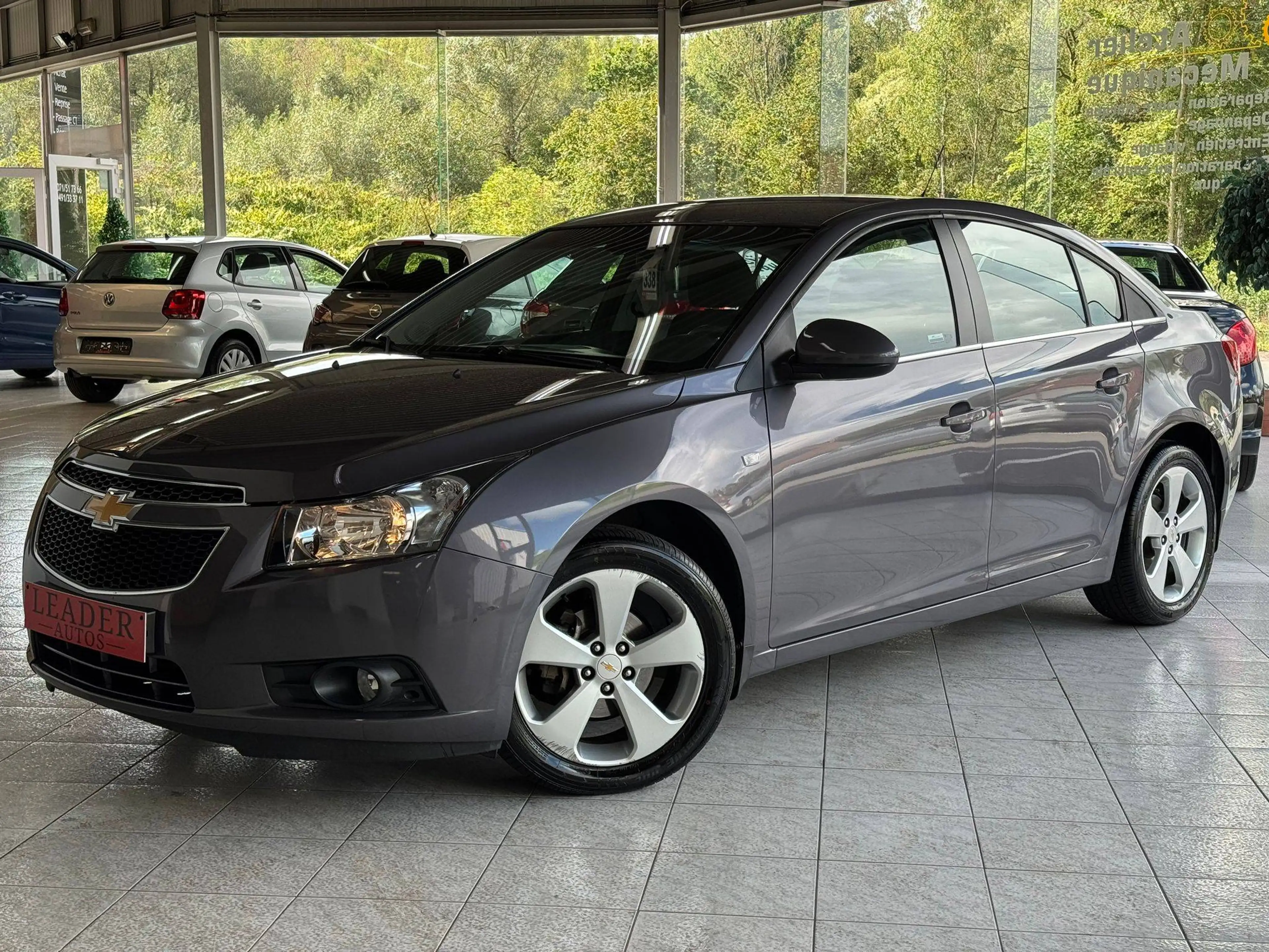 Chevrolet Cruze 🟩 1.8 ESSENCE 140CH - AUTOMATIQUE - AIRCO - CAPTEUR - FAIBLE KILOMETRAGE — photo 2