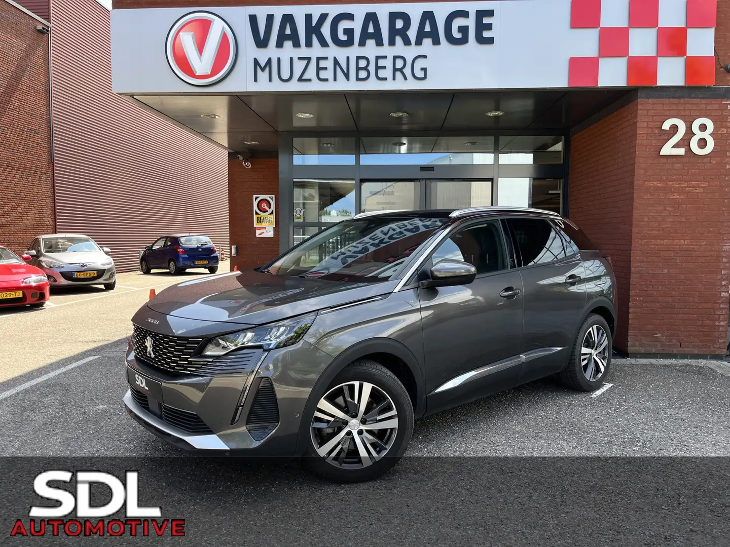 Peugeot 3008 1.6 HYbrid 225 Road Trip // FULL LED // KEYLESS // Grijs - 1