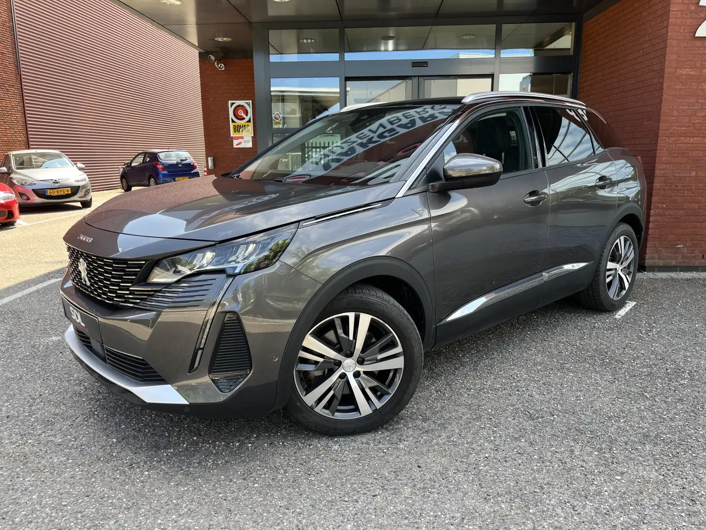 Peugeot 3008 1.6 HYbrid 225 Road Trip // FULL LED // KEYLESS // Grijs - 2
