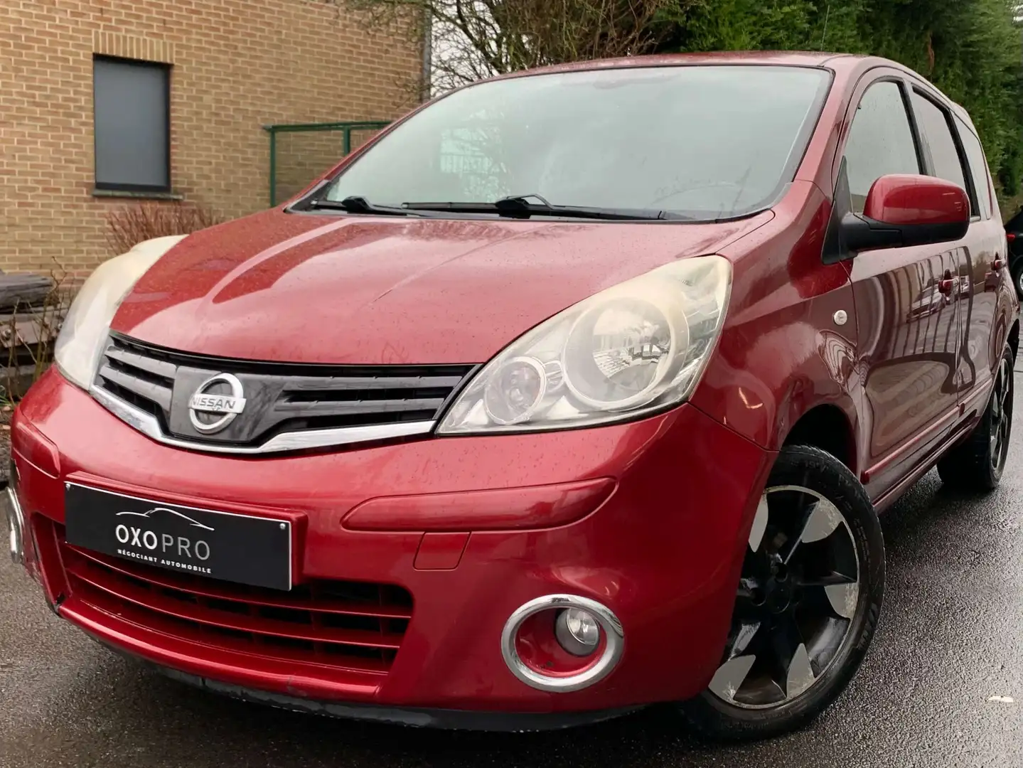 Nissan Note 1.4i Nickelodeon / Gps / Clim Auto / BRUIT MOTEUR Rouge - 1