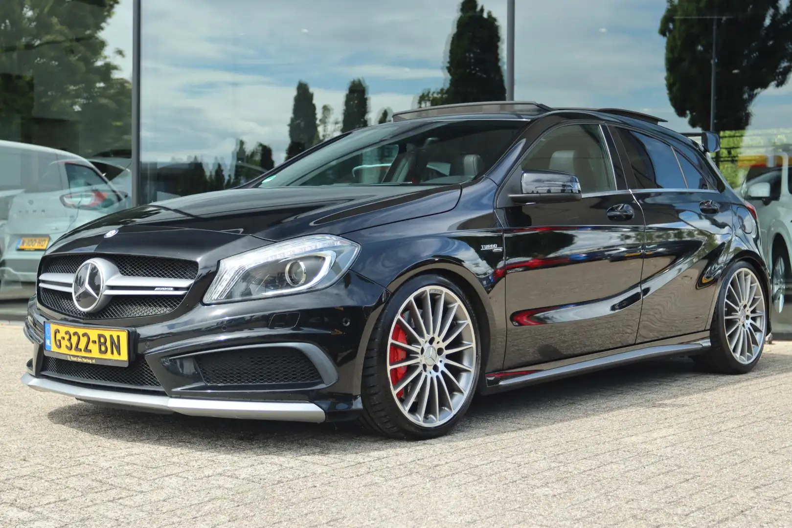 Mercedes-Benz A 45 AMG 4MATIC | PANO | CAPRISTO | HARMAN/KARDON | STOELVE Zwart - 1