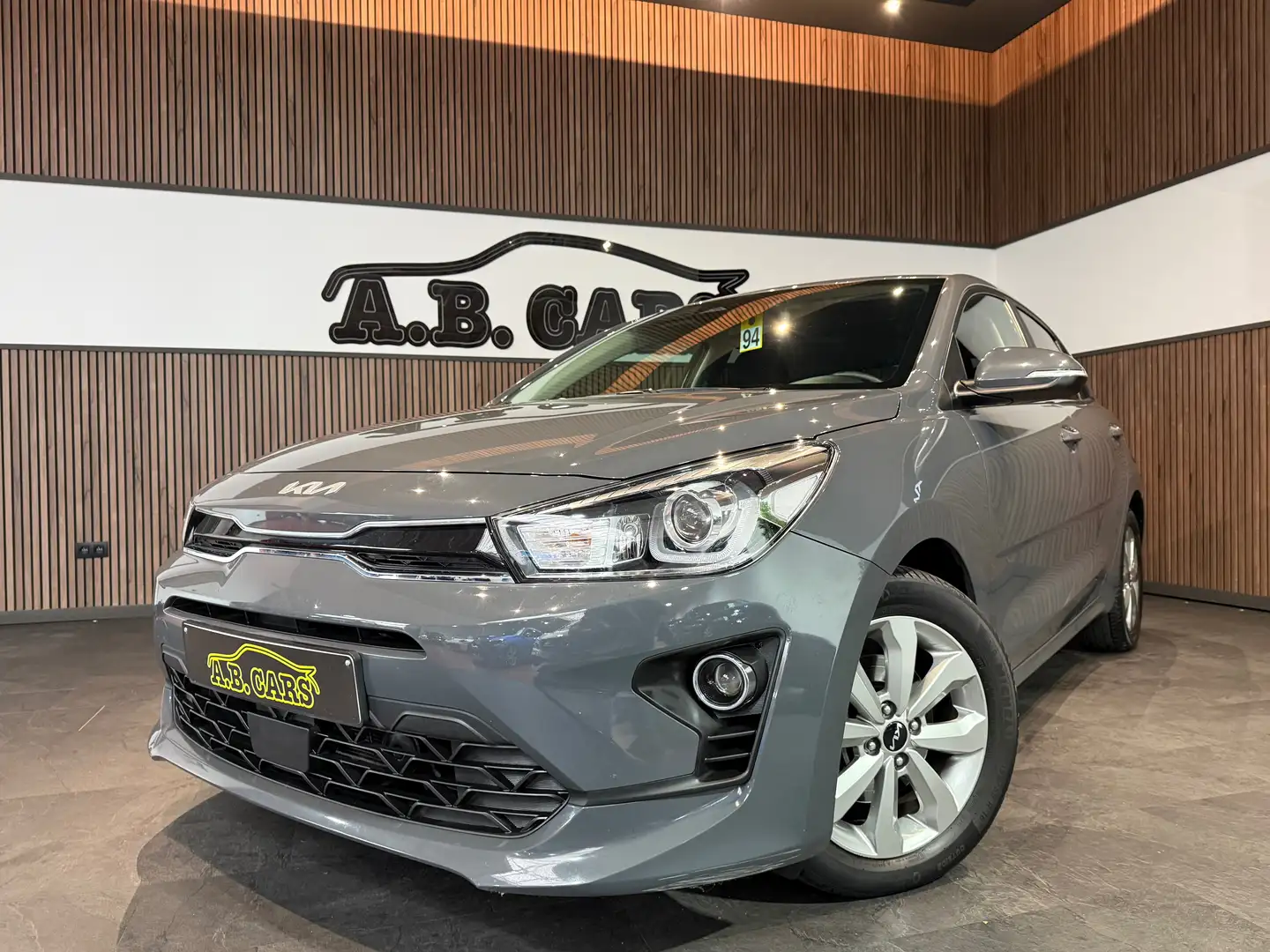 Kia Rio 1.0T *GARANTIE KIA 03/2029-150.000km*1ERE MAIN* Grijs - 1