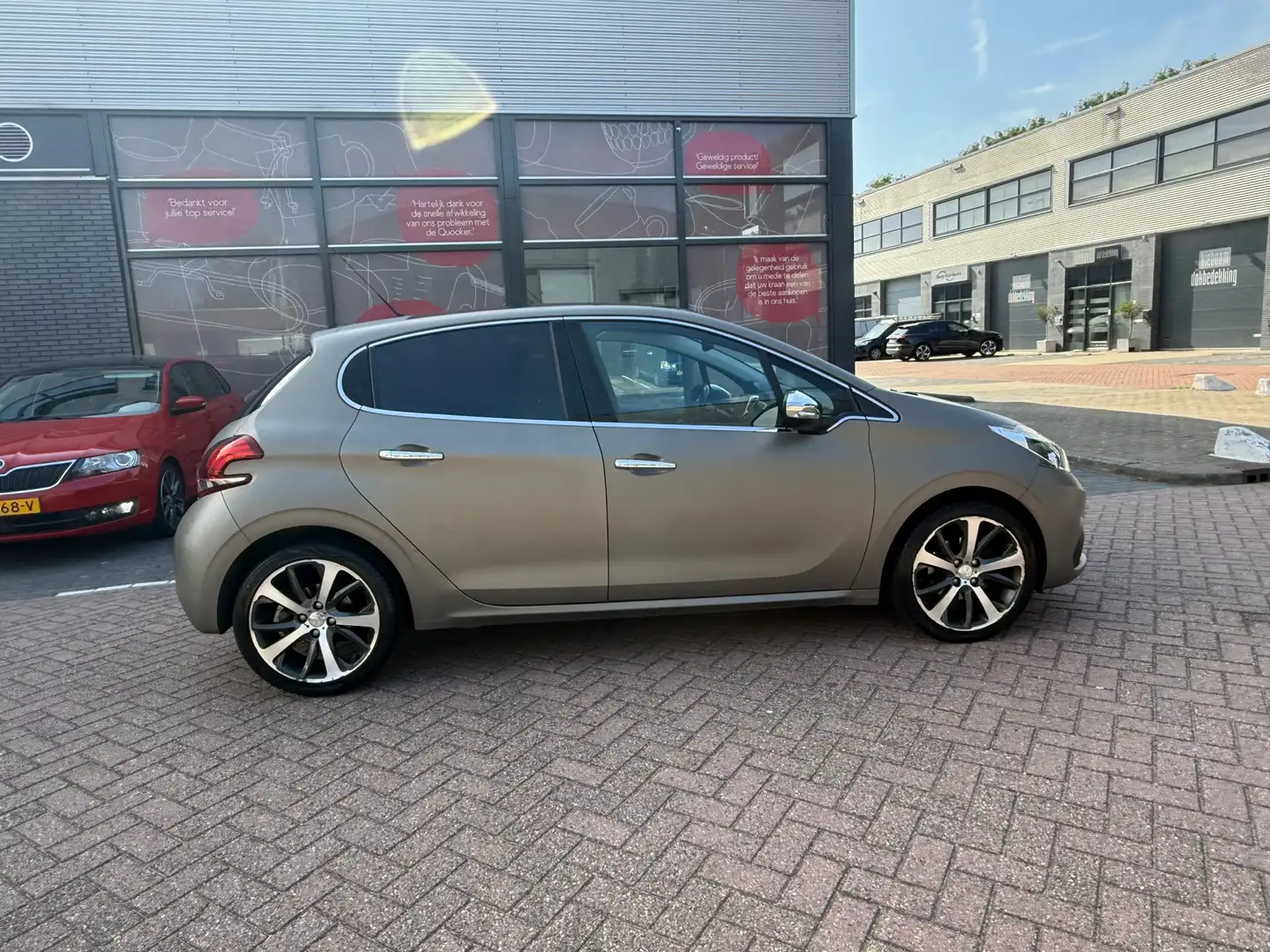 Peugeot 208 1.2 PureTech Première Camera Volle Automaat Volled Gris - 2
