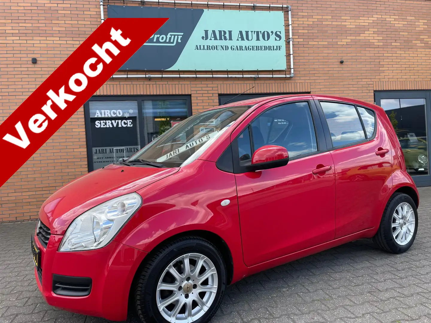 Suzuki Splash 1.0 Comfort 5drs, weinig km Rood - 1