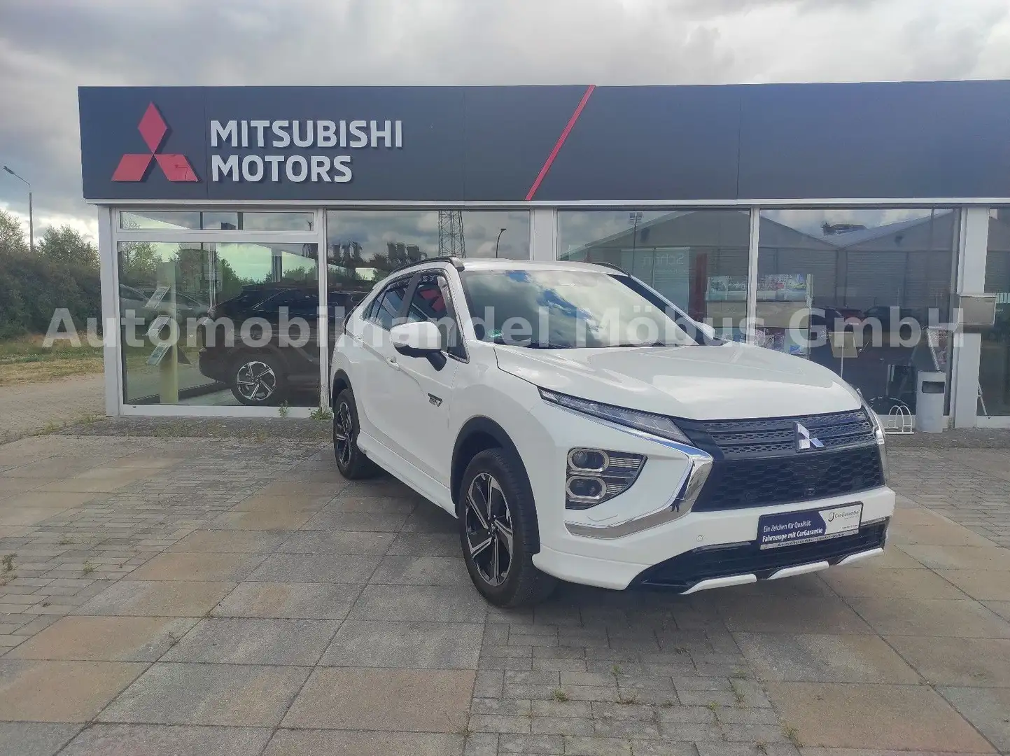 Mitsubishi Eclipse Cross Plus Select Hybrid 4WD Белый - 1