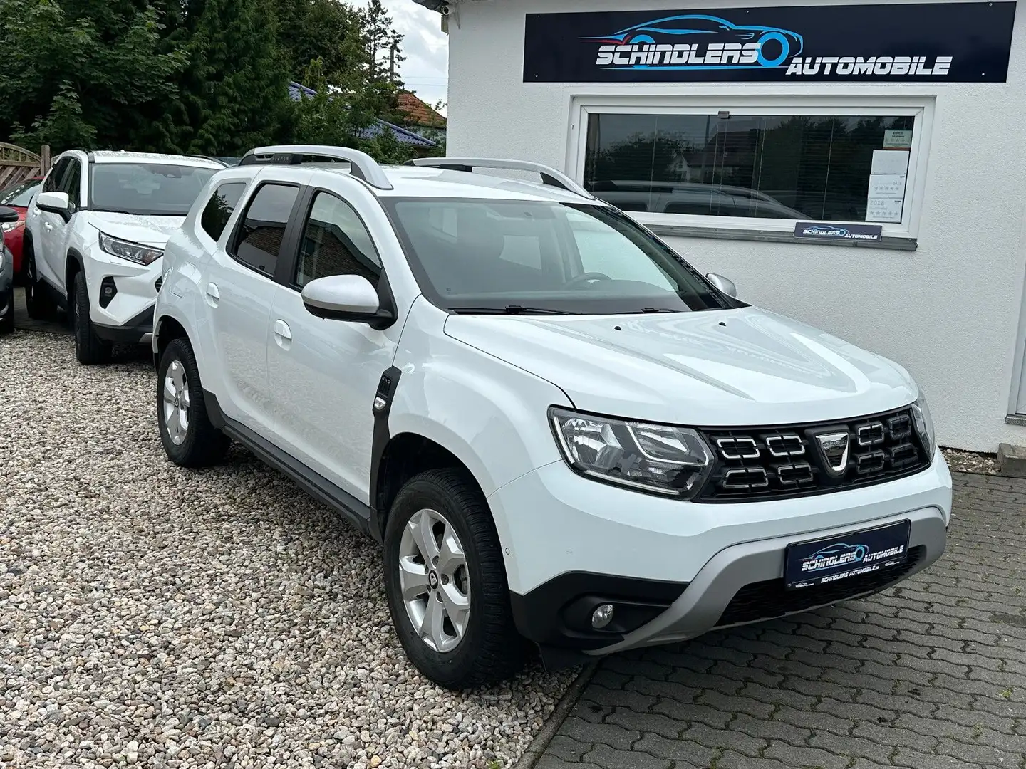 Dacia Duster II Prestige 4WD Navi PDC SHZ Tempom. MFL Weiß - 1