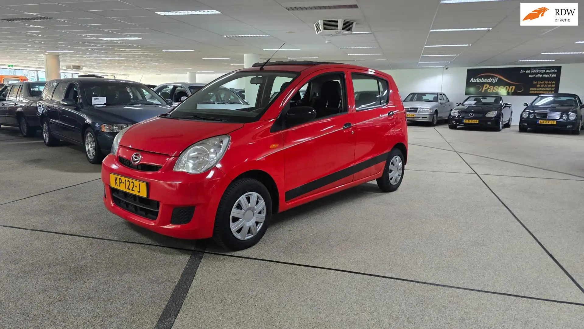 Daihatsu Cuore 1.0 Trend nieuwe apk Rot - 1