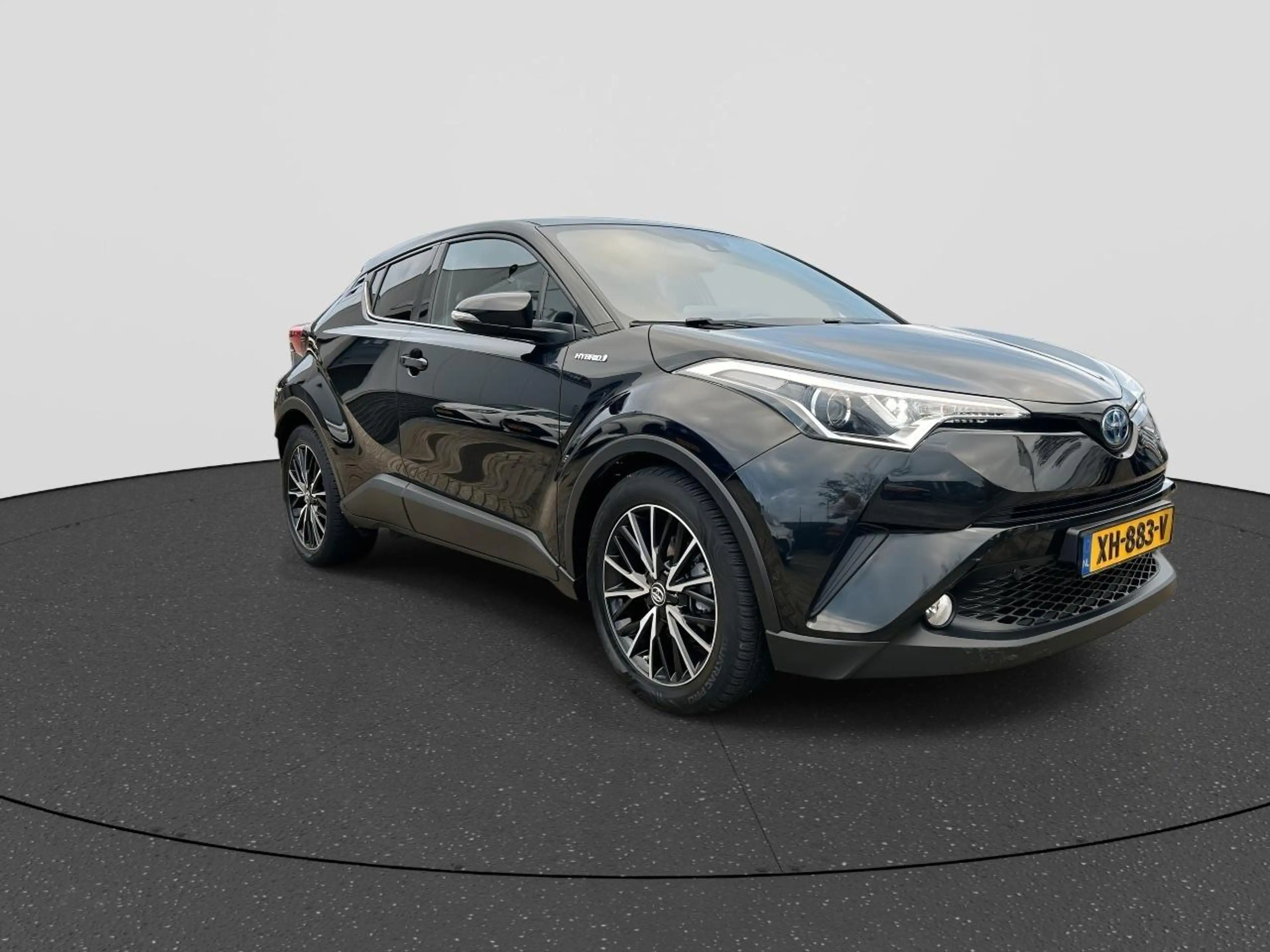 Toyota C-HR 1.8 Hybrid Dynamic RIJKLAAR | Navi Via App | Clima — photo 7